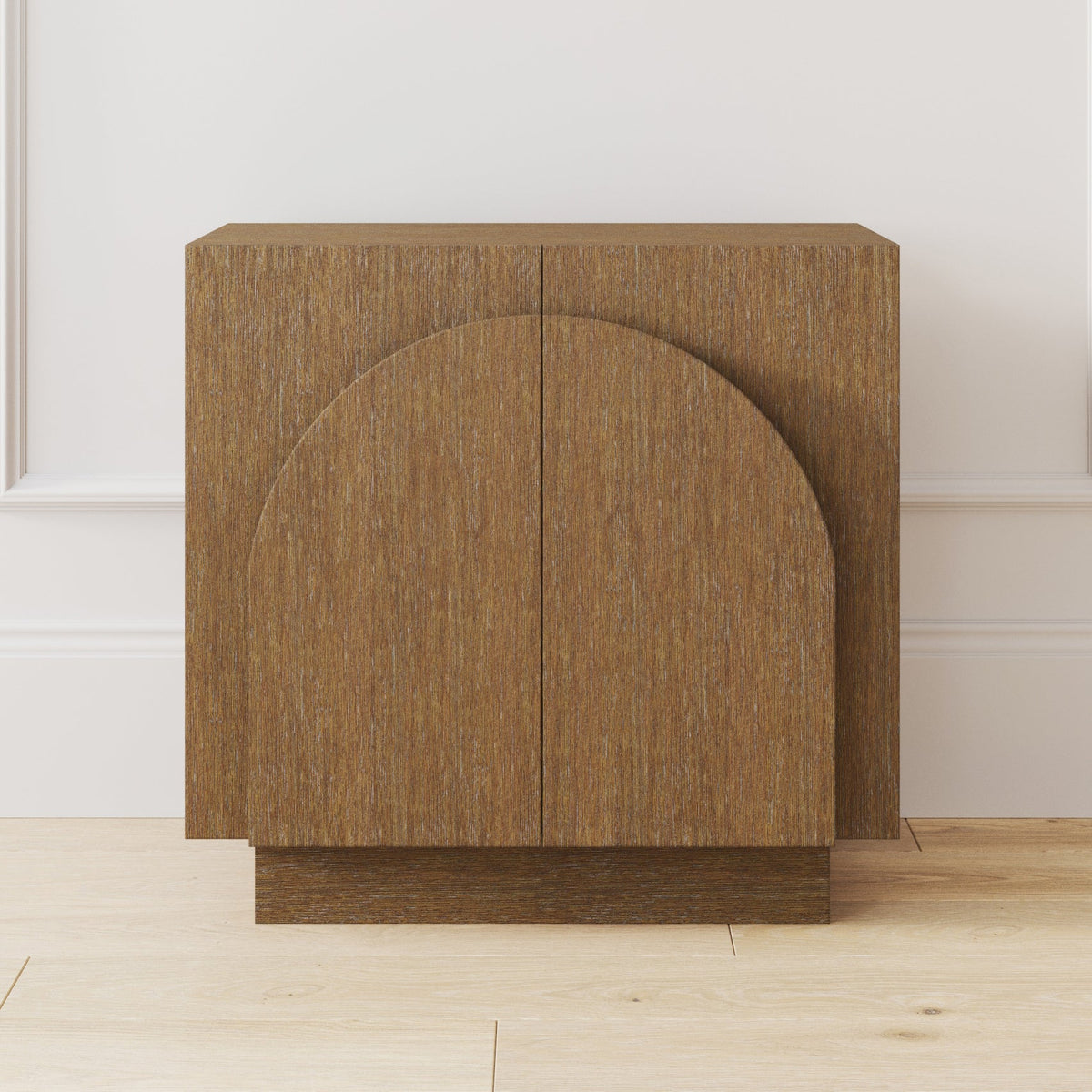 A wooden cabinet with a double-door front featuring a protruding arched design.