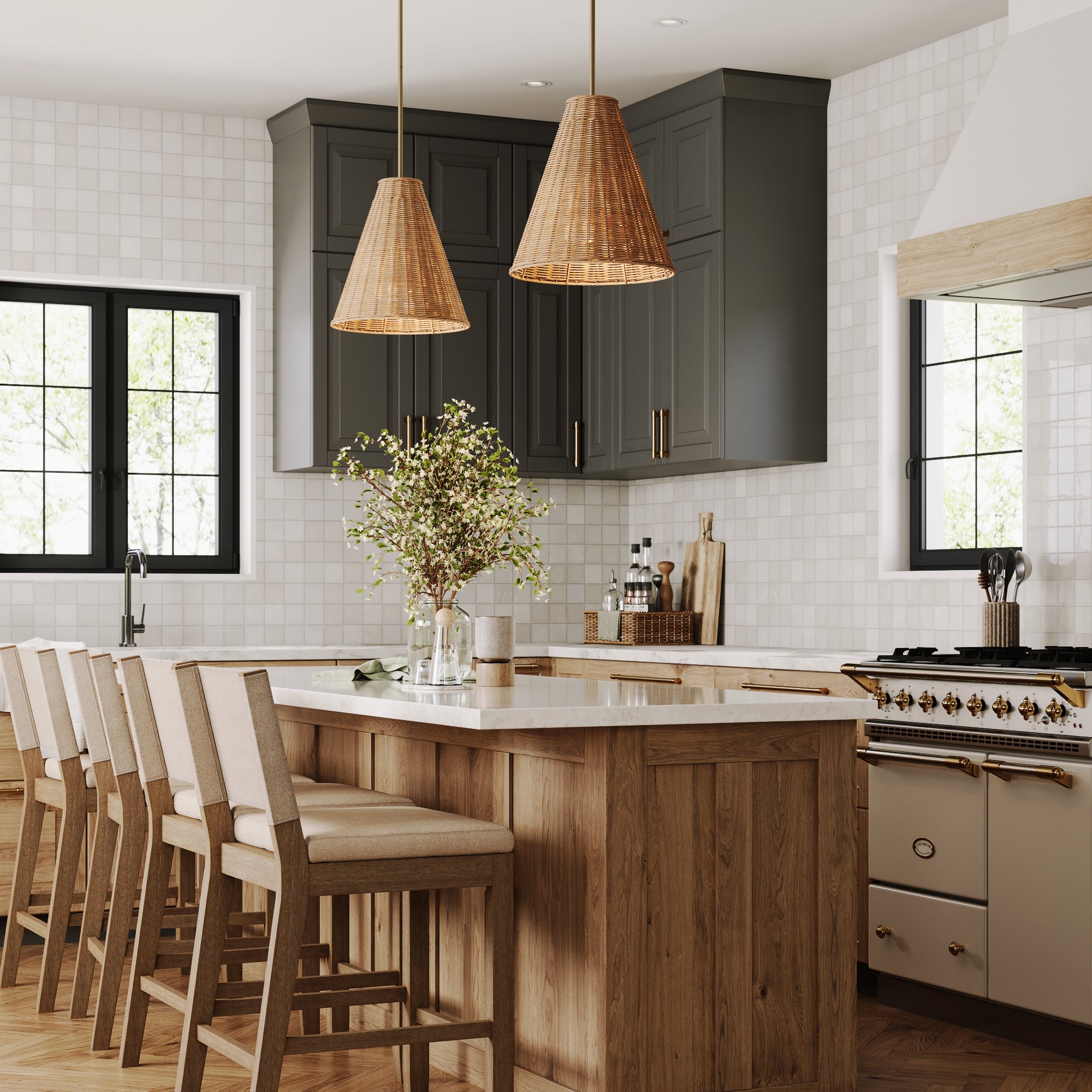 A kitchen with a large island and chairs, illuminated by Nathan James Boho Pendant Light Fixtures with oversized rattan shades (set of 2).
