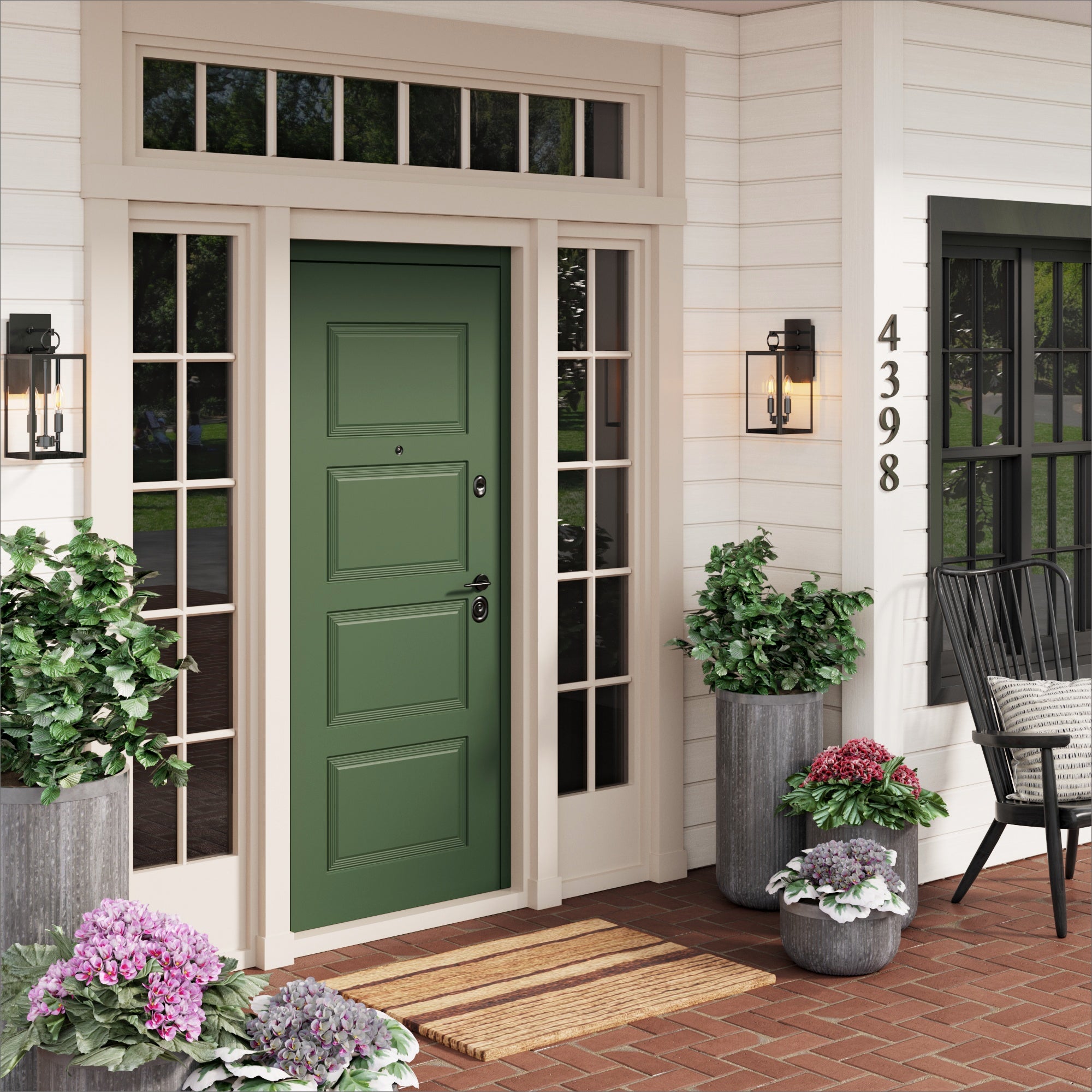 A green front door with side windows, flanked by potted plants and outdoor wall lanterns. A doormat sits on the brick porch, with house number 4398 on white siding and a black chair near a window.