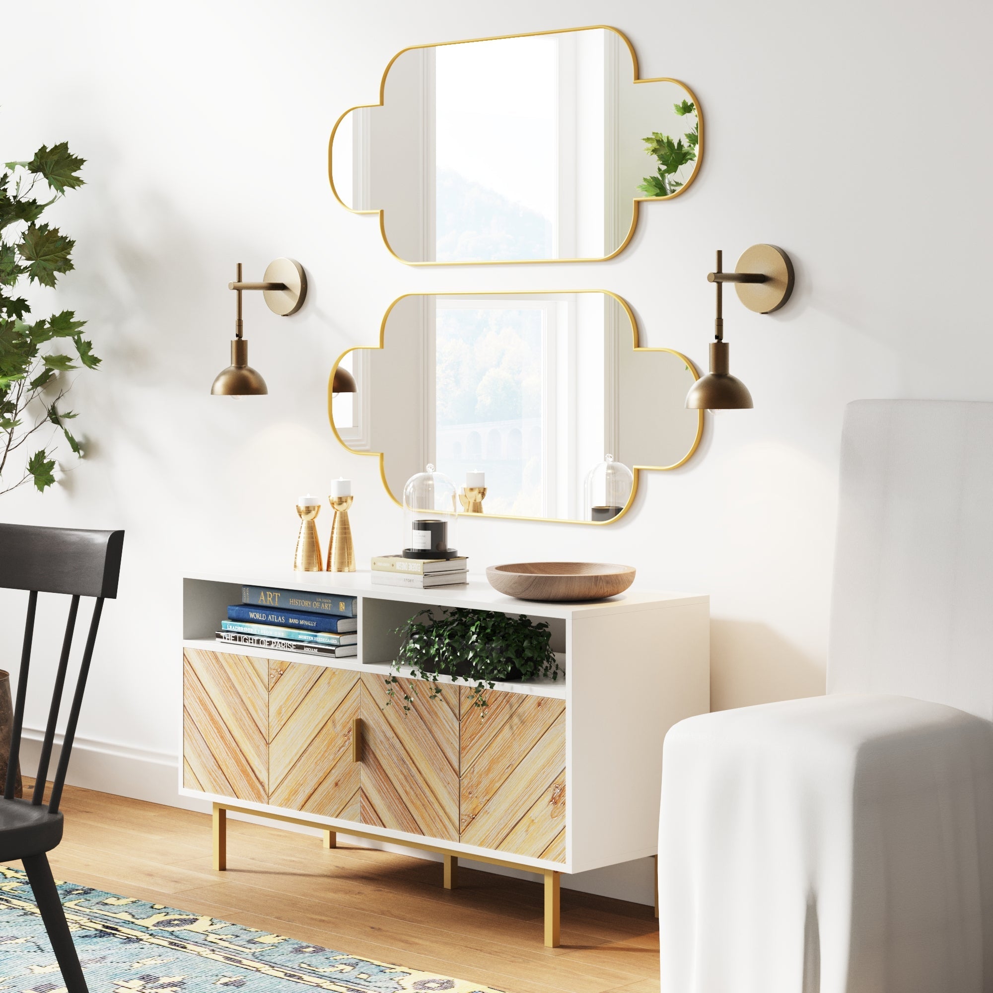 A white chair pairs perfectly with the Nathan James Plug-in Metal Wall Lights Brass (Set of 2), creating a stylish, modern space.