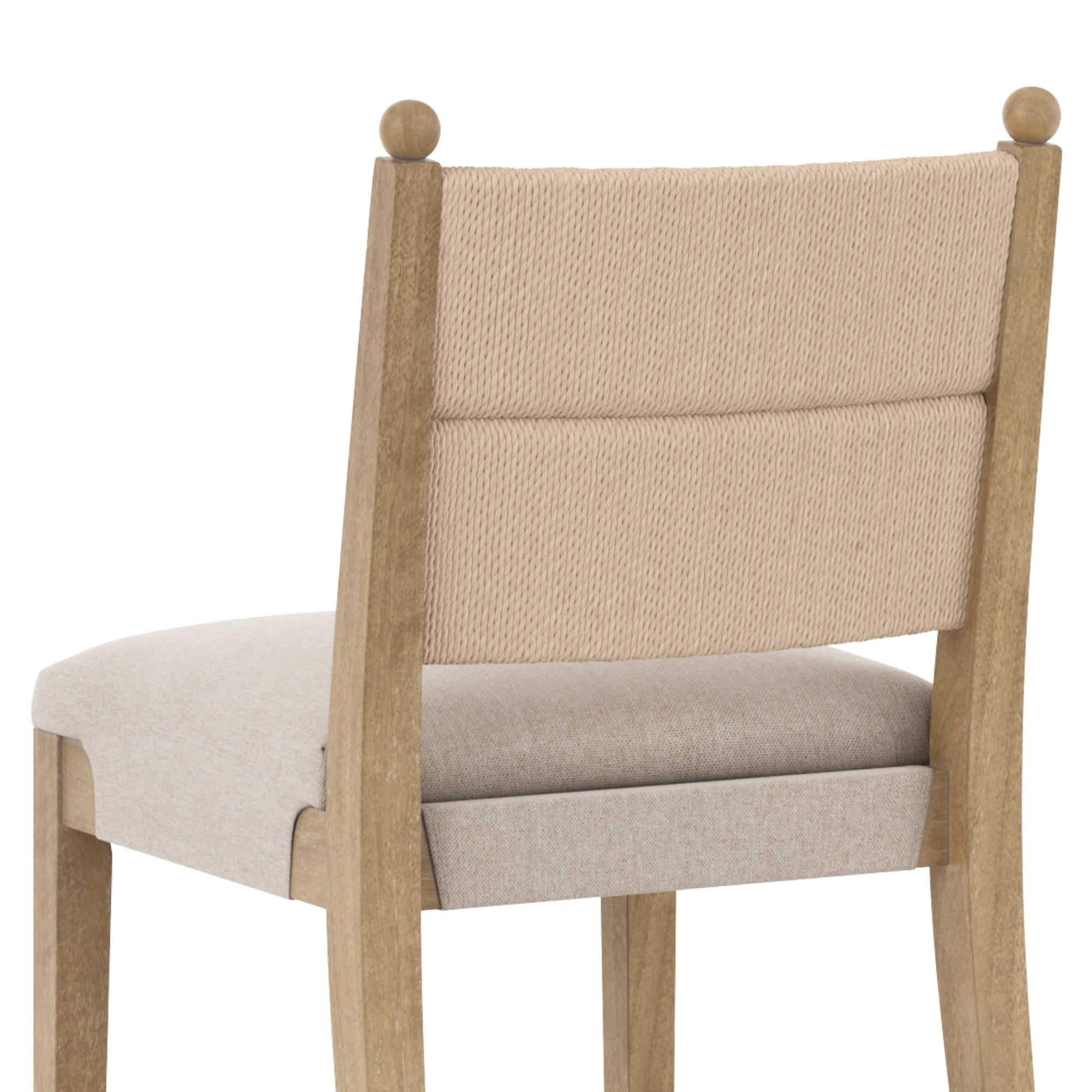 A wooden chair with light beige upholstered seat and backrest, featuring a textured panel on the upper back. The chair has round wooden finials on the top corners of the backrest.