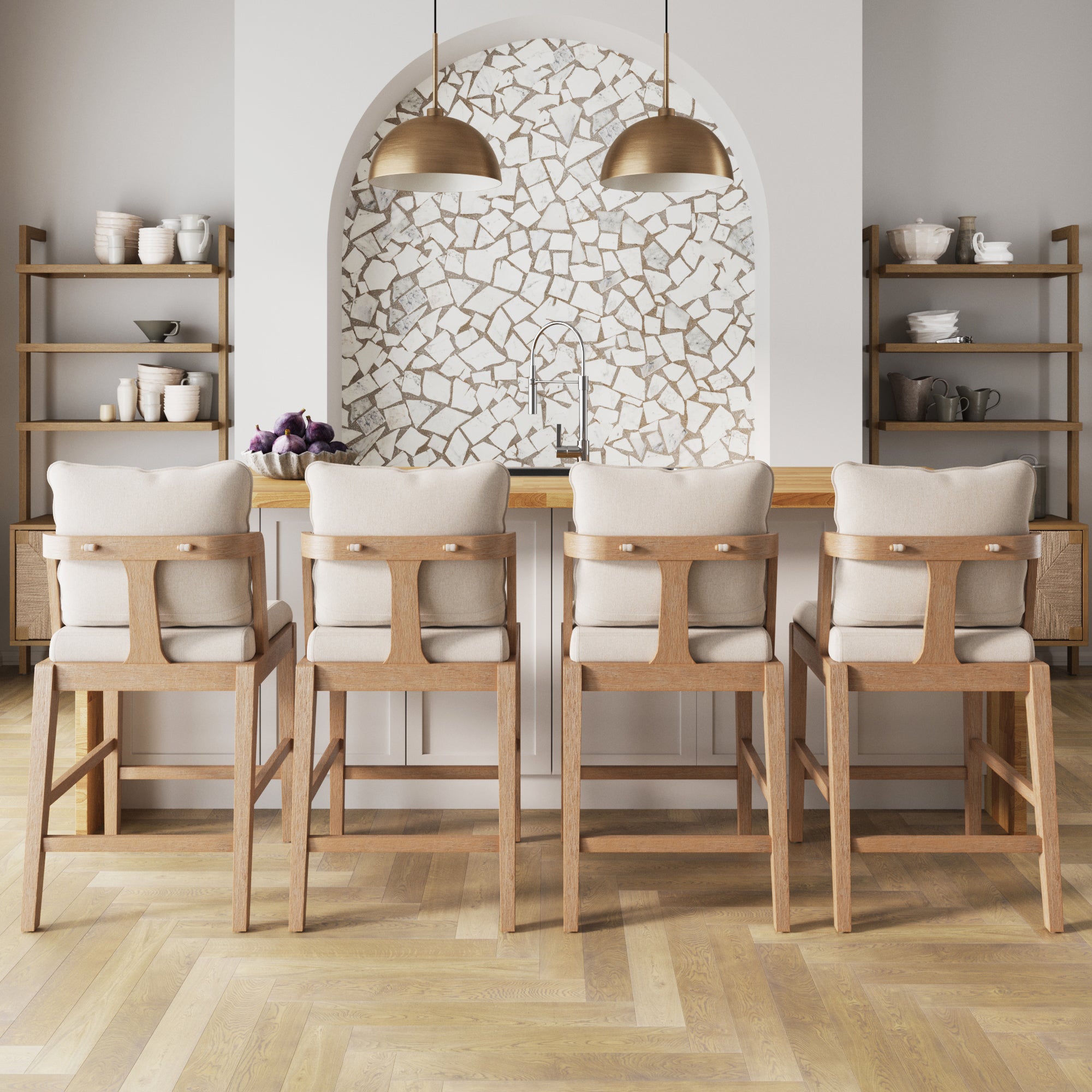 Four Nathan James Scandinavian Bar Stools with backrests in light brown are lined up at a kitchen island, set against a mosaic tile backsplash, open shelving with dishes, and two pendant lights overhead. Set includes 4 stools.