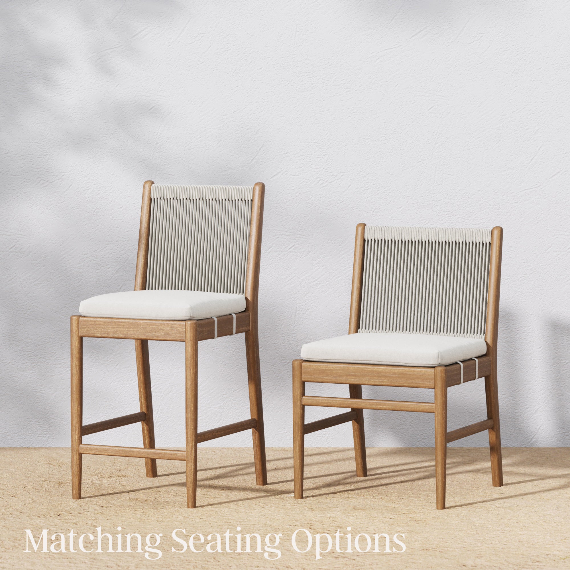 Two wooden chairs with light-colored rope backs and white cushions sit side by side on a neutral floor against a white wall. Text at the bottom reads, Matching Seating Options.