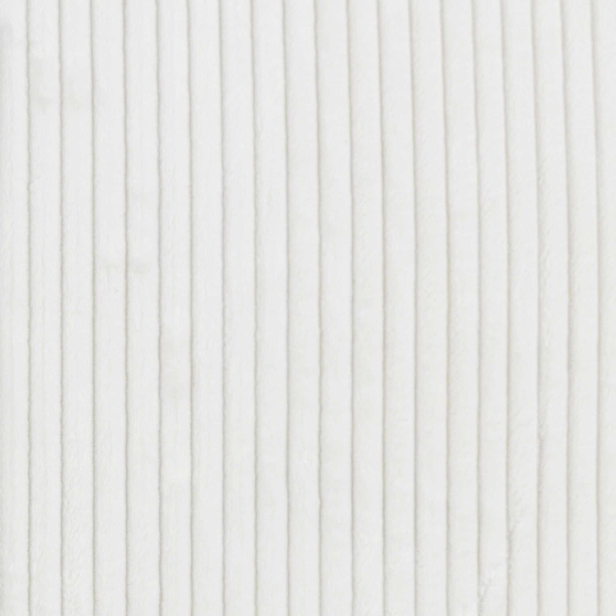 Close-up of a white corduroy fabric, showing vertical, evenly spaced ridges with a soft, textured appearance.