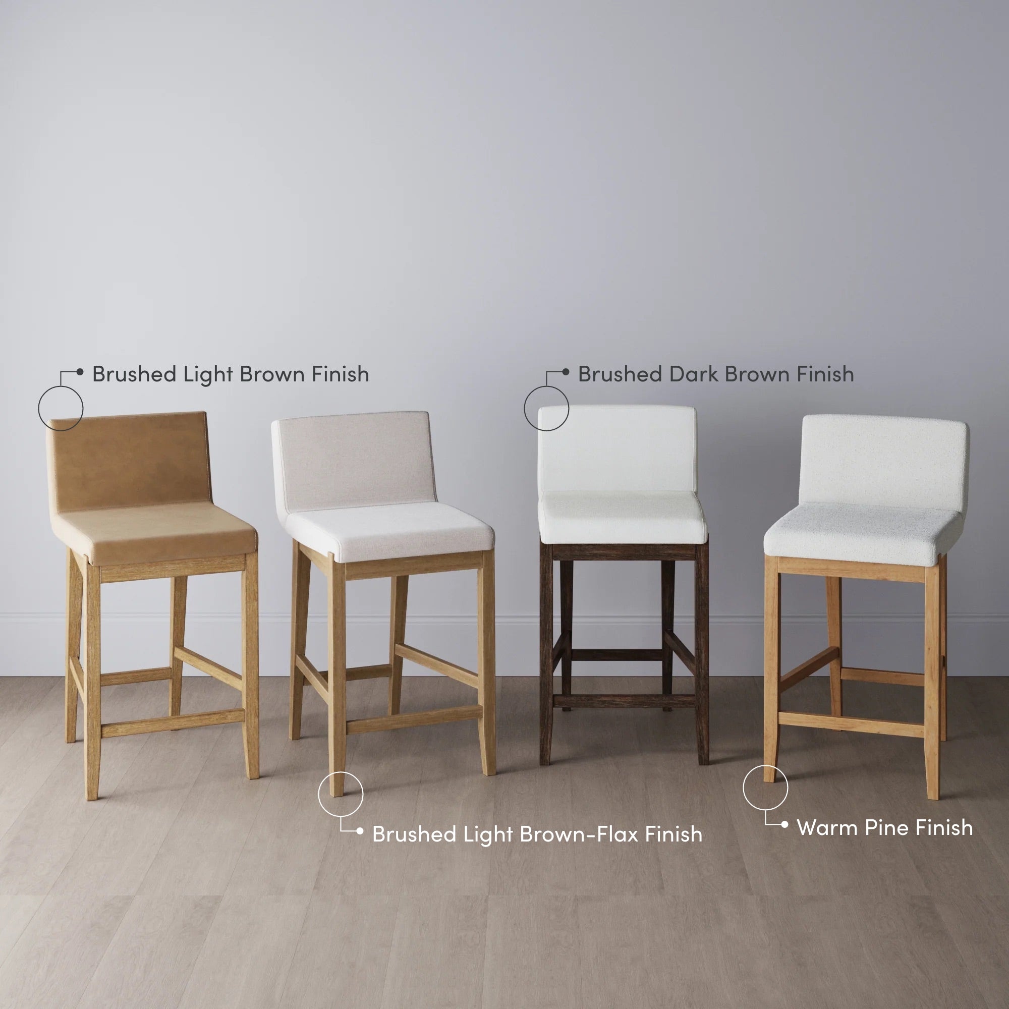 Four upholstered bar stools are lined up in front of a gray wall, each with a labeled finish: Brushed Light Brown, Brushed Light Brown-Flax, Brushed Dark Brown, and Warm Pine.