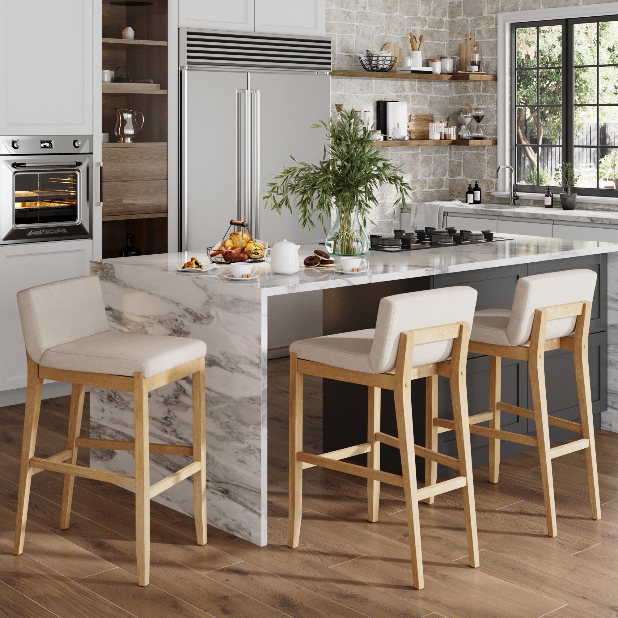 Modern kitchen with a marble island, set of 3 Nathan James Exposed Wood Back Boucle Bar Stools in Warm Pine Boucle, built-in oven, stainless steel fridge, potted plant, breakfast on the counter, and a large window with natural light.