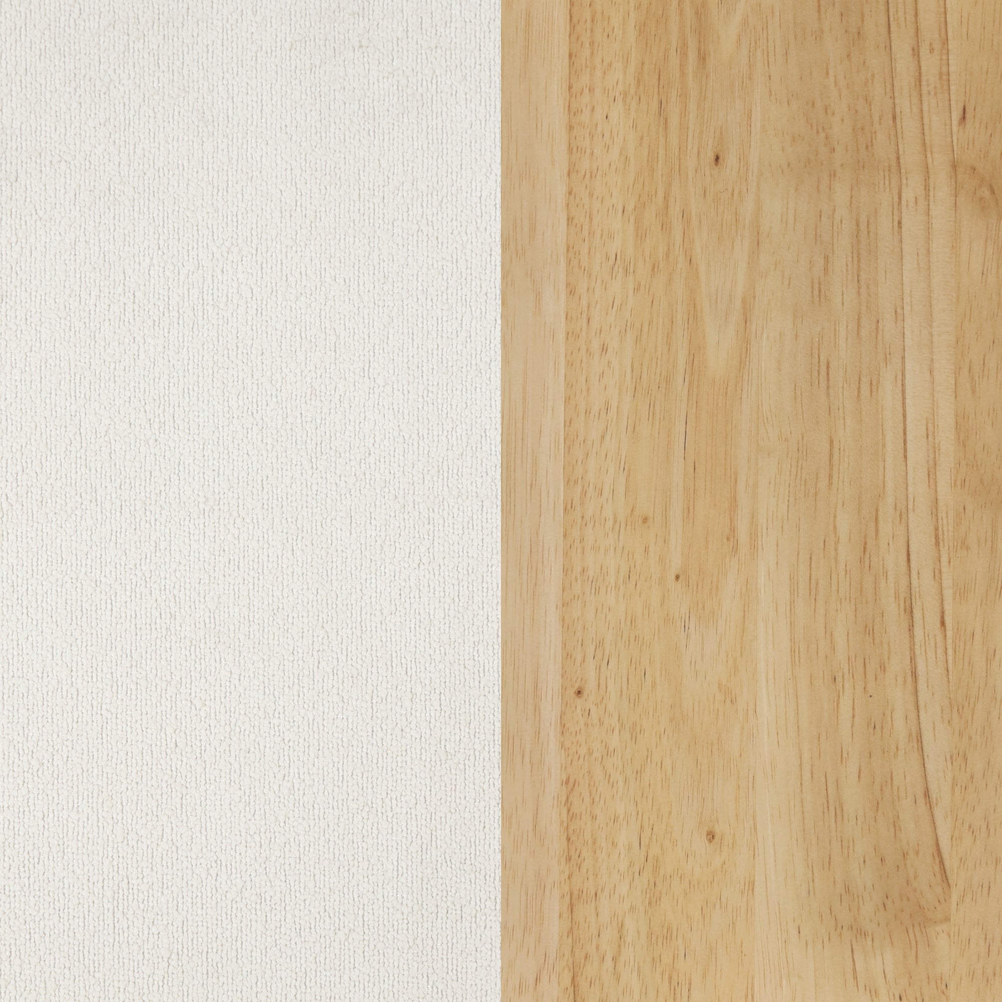 A surface divided vertically: the left half is textured white fabric, and the right half is smooth, light-colored wood with subtle grain patterns.