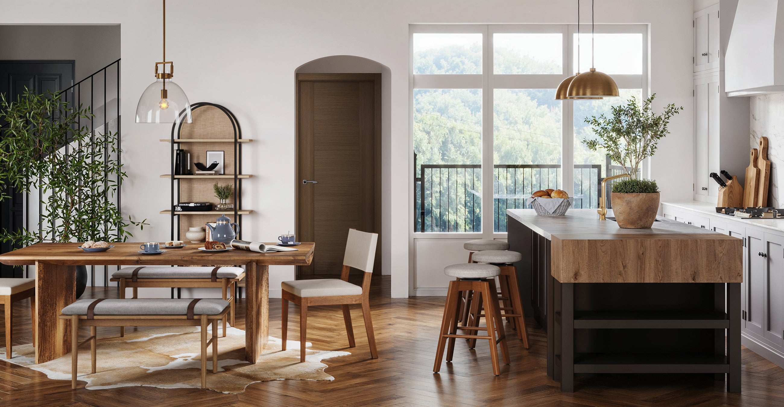 Modern kitchen and dining area with wooden furniture, island with stools, open shelving, large windows with views of trees, and decorative plants. Space is bright, minimal, and inviting.