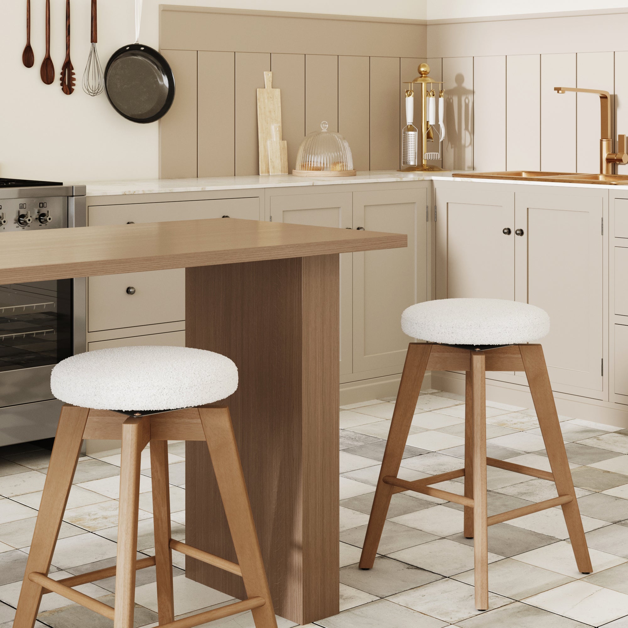 Modern kitchen with light beige cabinets, white countertops, wood island, and Nathan James Wood Boucle Counter Height Swivel Counter Stools in White Oak. Copper faucet and accents; white and gray tiled floor.