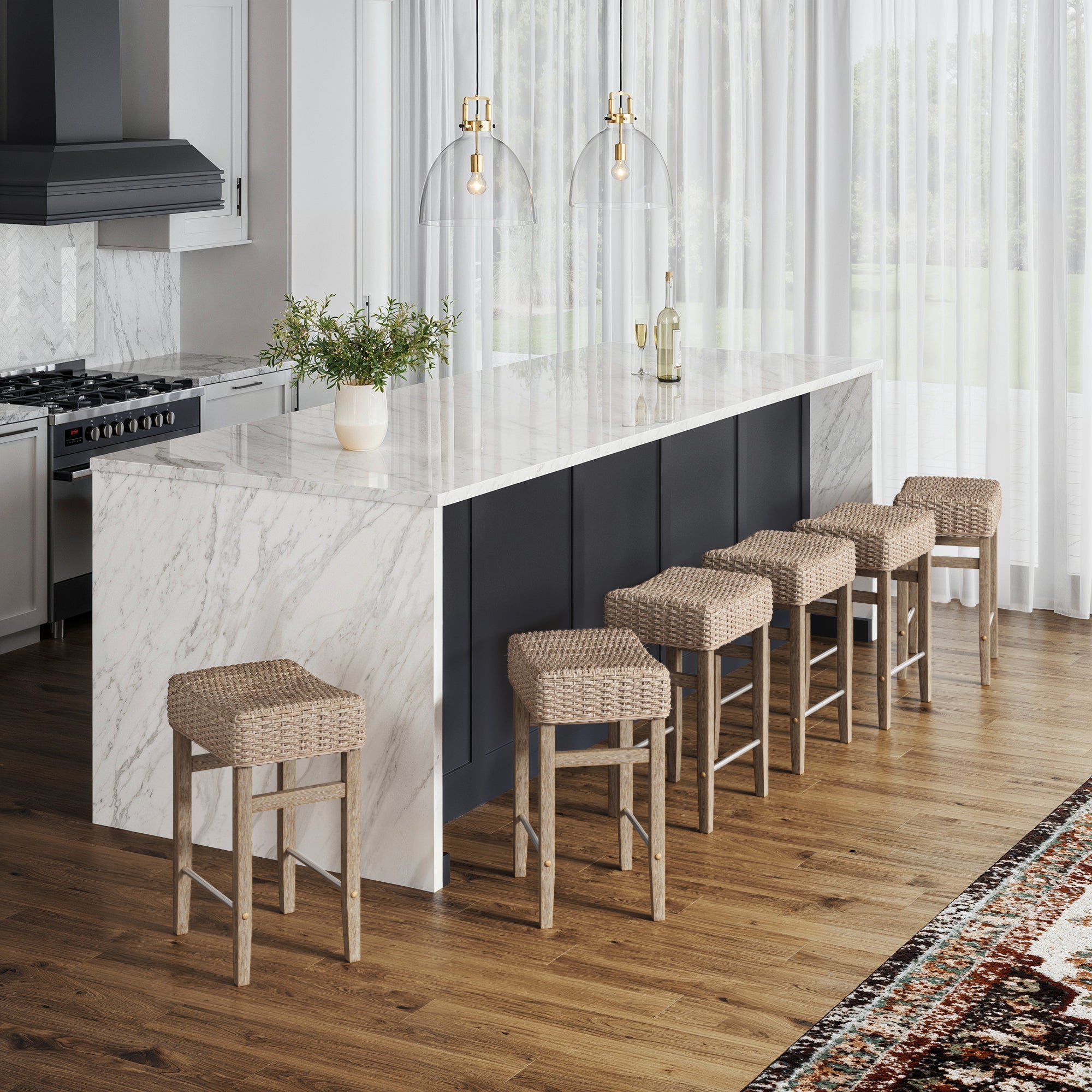 A kitchen with a counter and Nathan James Seagrass Counter Height Bar Stools in brown (set of 6), each with a woven seagrass seat, adds natural warmth and style.