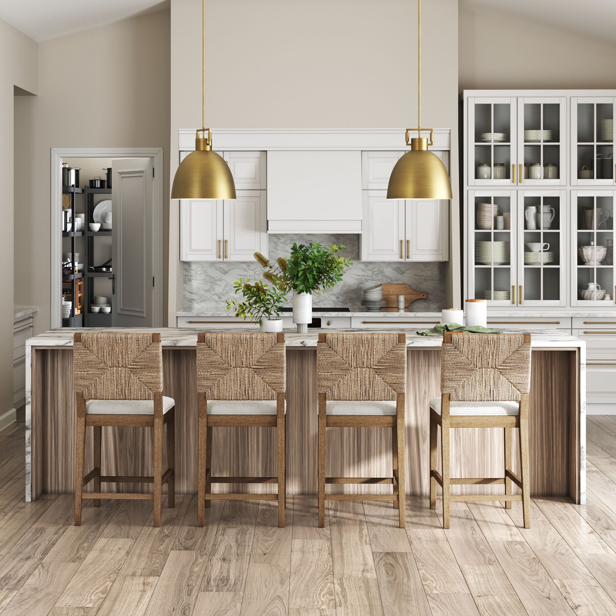 Modern kitchen with a large island, white cabinets, marble countertops, glass-front pantry, and two gold pendant lights. Four Nathan James Seagrass Counter Height Bar Stools in Light Brown and green plants add fresh style to the neutral decor.