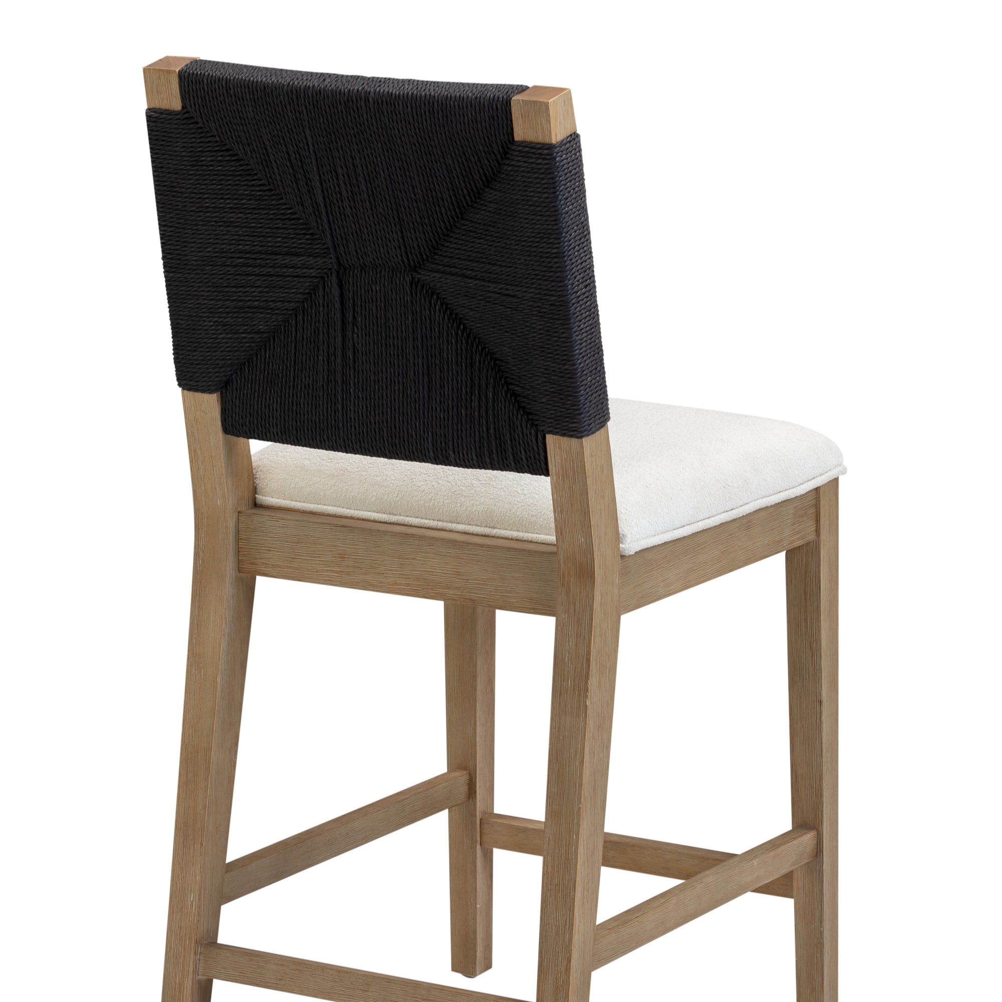 A modern wooden bar stool with a beige upholstered seat and a black cord-wrapped backrest, featuring a geometric pattern.