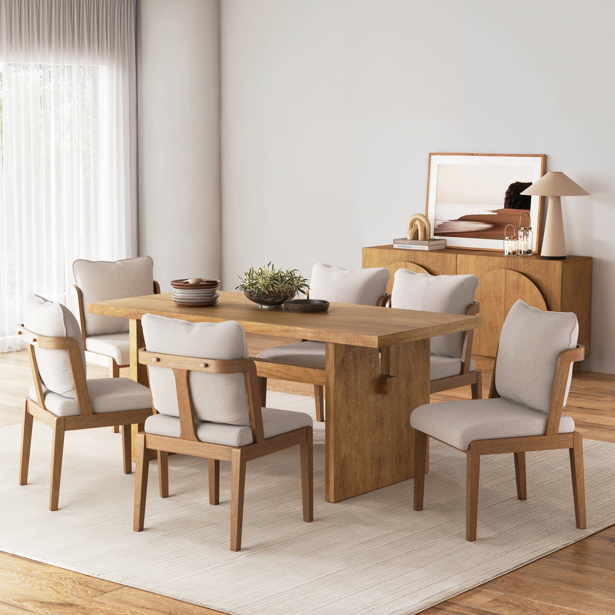 A modern dining room featuring a wooden table, a Nathan James Scandinavian Dining Chair with Back Light Brown (Set of 6), a matching sideboard, neutral decor, a centerpiece, and natural light through windows with sheer curtains.