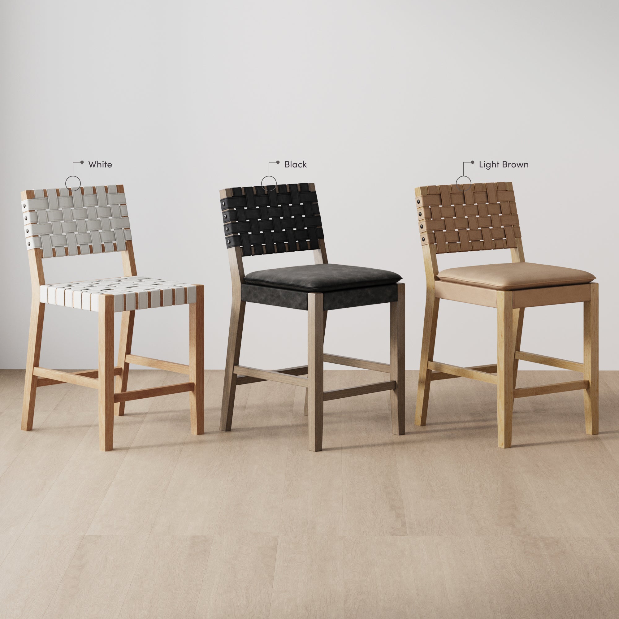 Three wooden chairs with woven backs and seats are displayed side by side. The left chair has white webbing, the middle has black, and the right has light brown, each labeled with its color on a plain background.