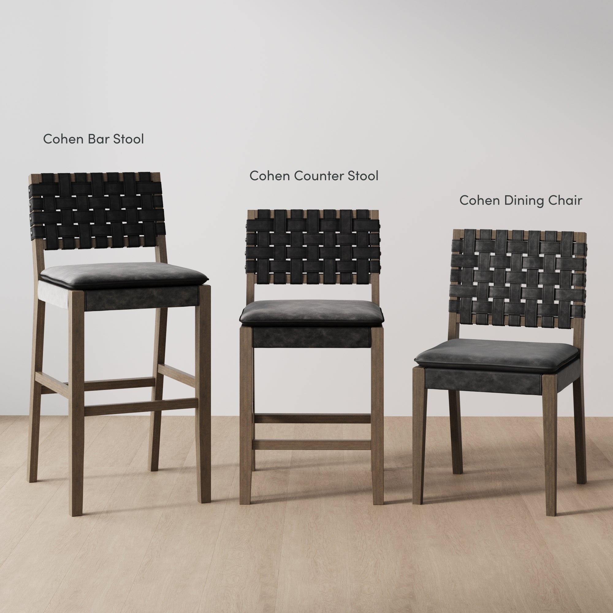 Three wooden chairs with black woven backs and seats are displayed side by side: a tall bar stool, a medium-height counter stool, and a shorter dining chair, all labeled accordingly against a plain background.