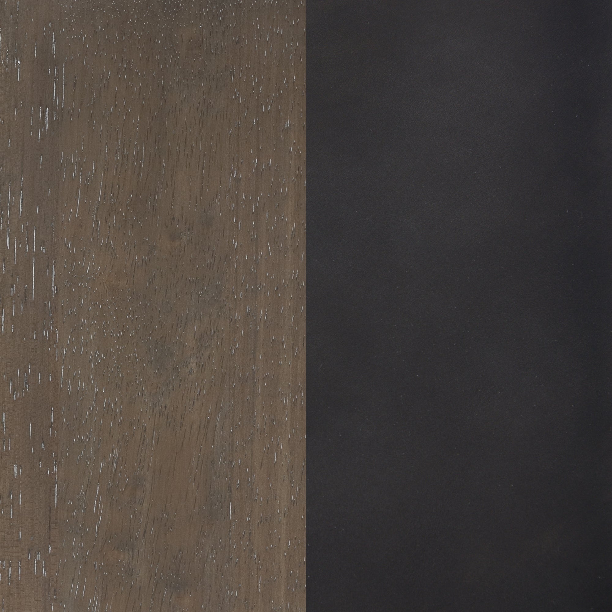 A rectangular surface split vertically; the left side has a textured brown wood grain, while the right side is a smooth solid black.