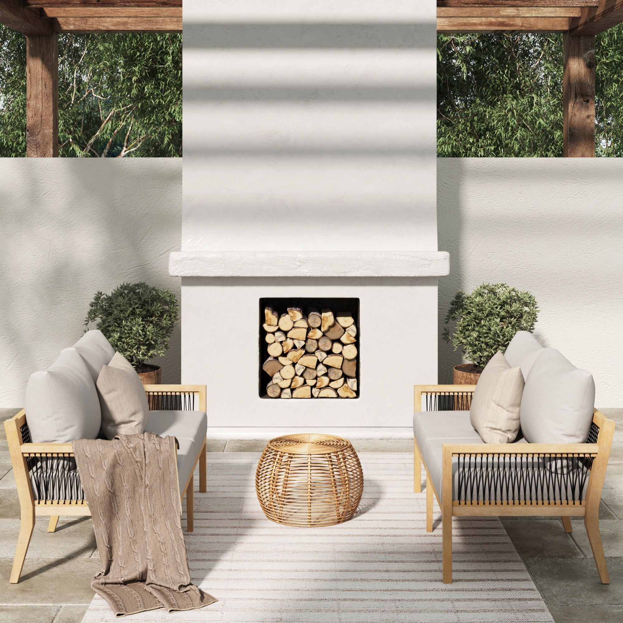 Enjoy your outdoor space with Nathan James Outdoor Patio Wood Loveseats Gray Acacia (Set of 2), featuring weather-resistant frames, gray cushions and pillows, a wicker coffee table, fireplace, potted plants, and a neutral rug.