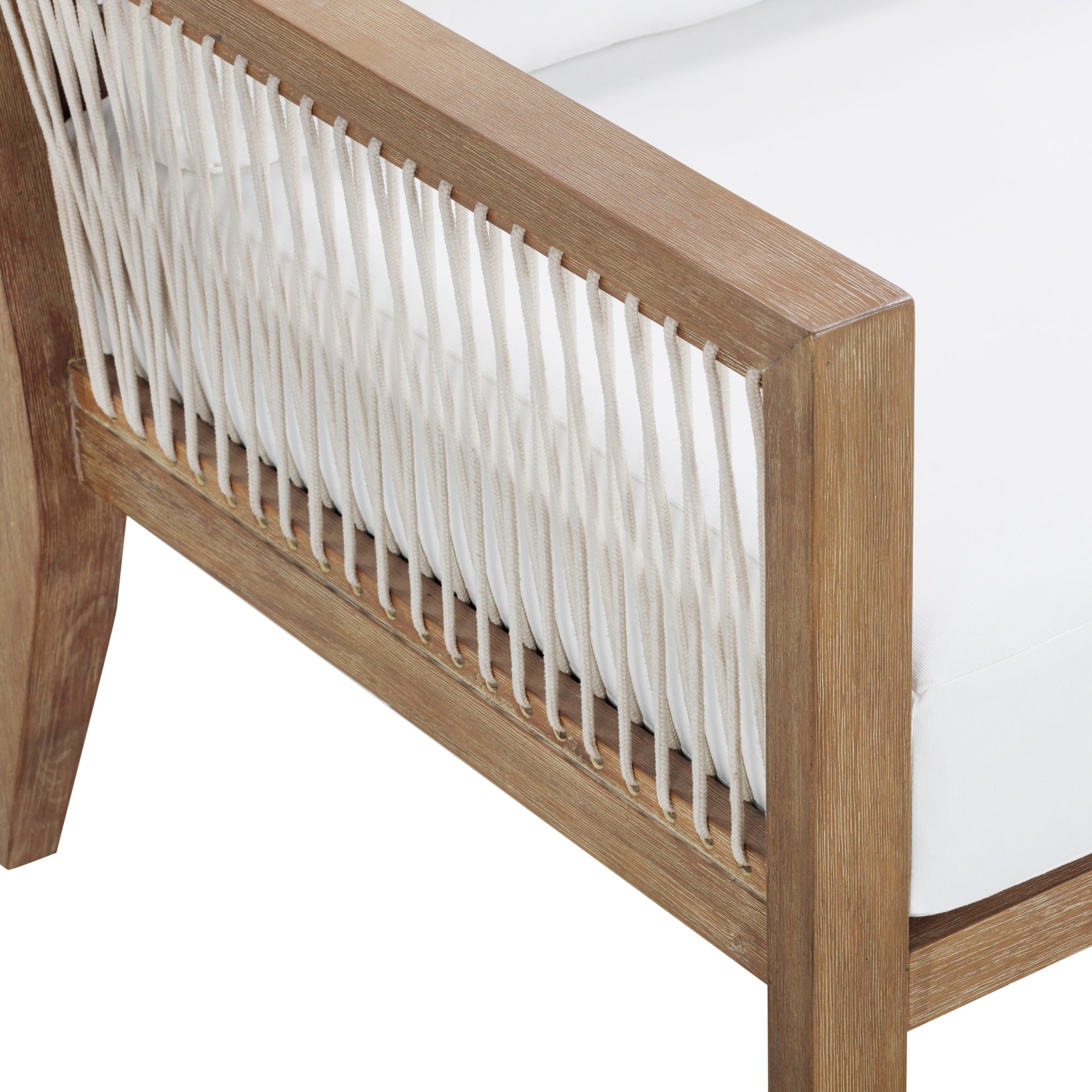 Close-up of a wooden chair armrest with white rope detailing along the side and a white cushioned seat. The design highlights the combination of natural wood and woven accents.
