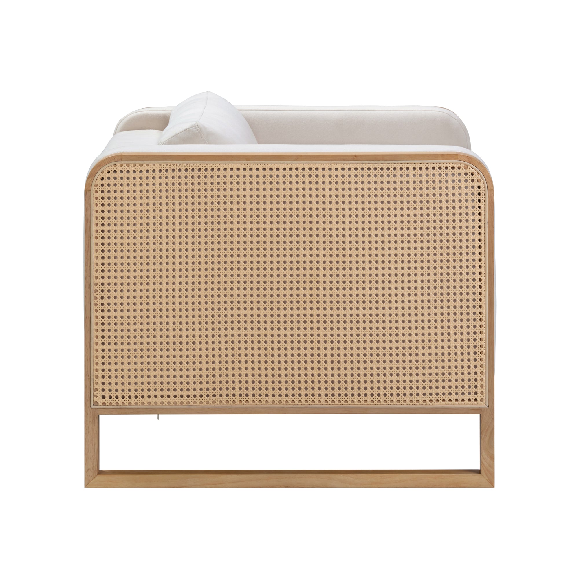 Side view of a sofa with a woven cane panel framed in light wood, featuring cream-colored cushions and a sleek, minimalist design. The background is plain white.