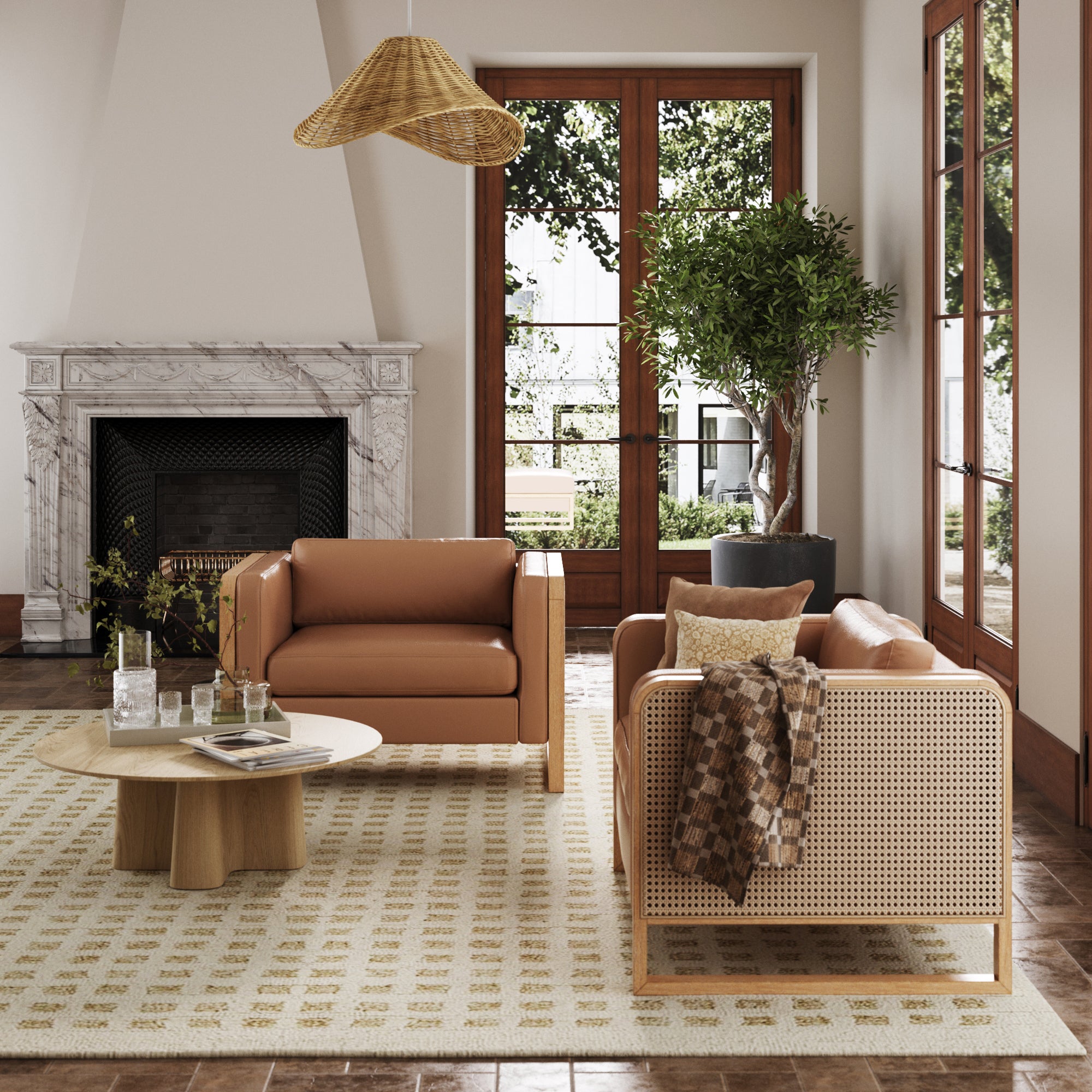 A cozy living room with two tan armchairs, a round wooden coffee table, a patterned rug, a marble fireplace, large windows, a potted plant, and a woven pendant light. Sunlight streams through glass doors.
