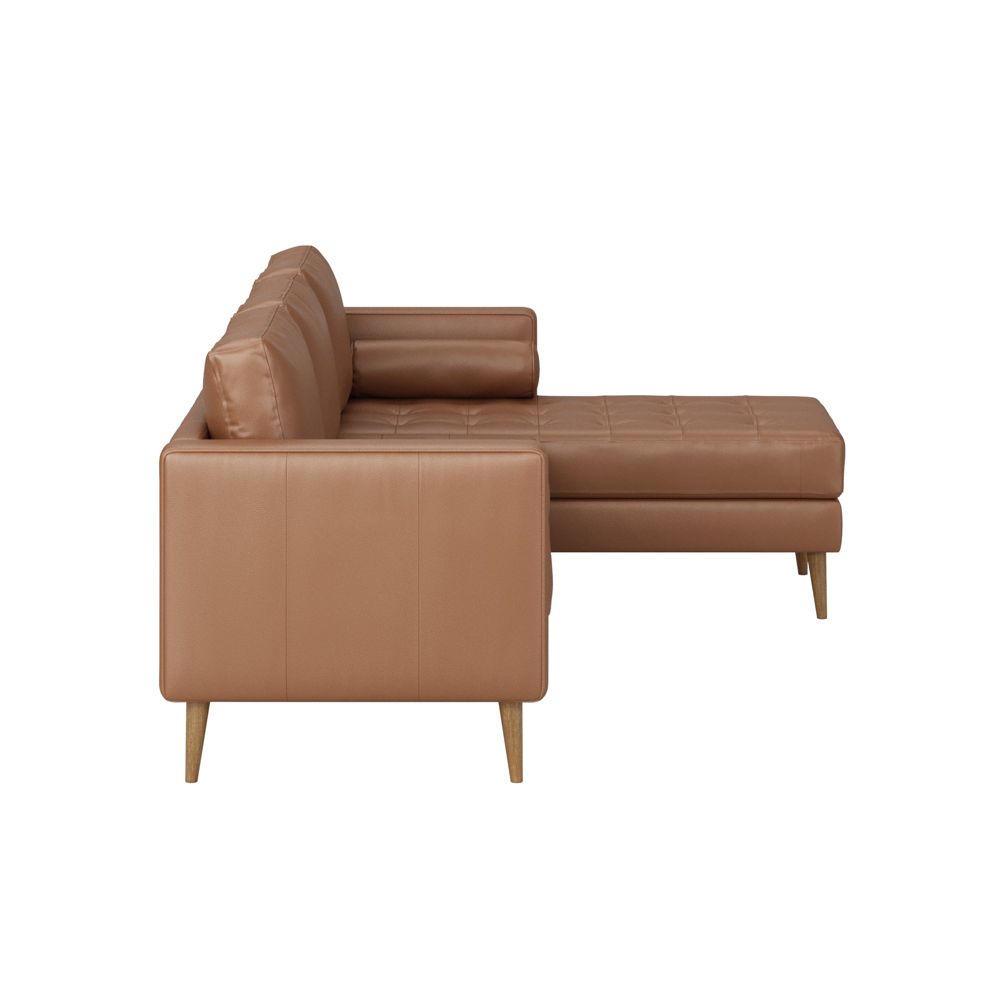 Side view of a modern tan leather sectional sofa with tufted cushions, square armrests, and wooden legs, isolated on a white background.