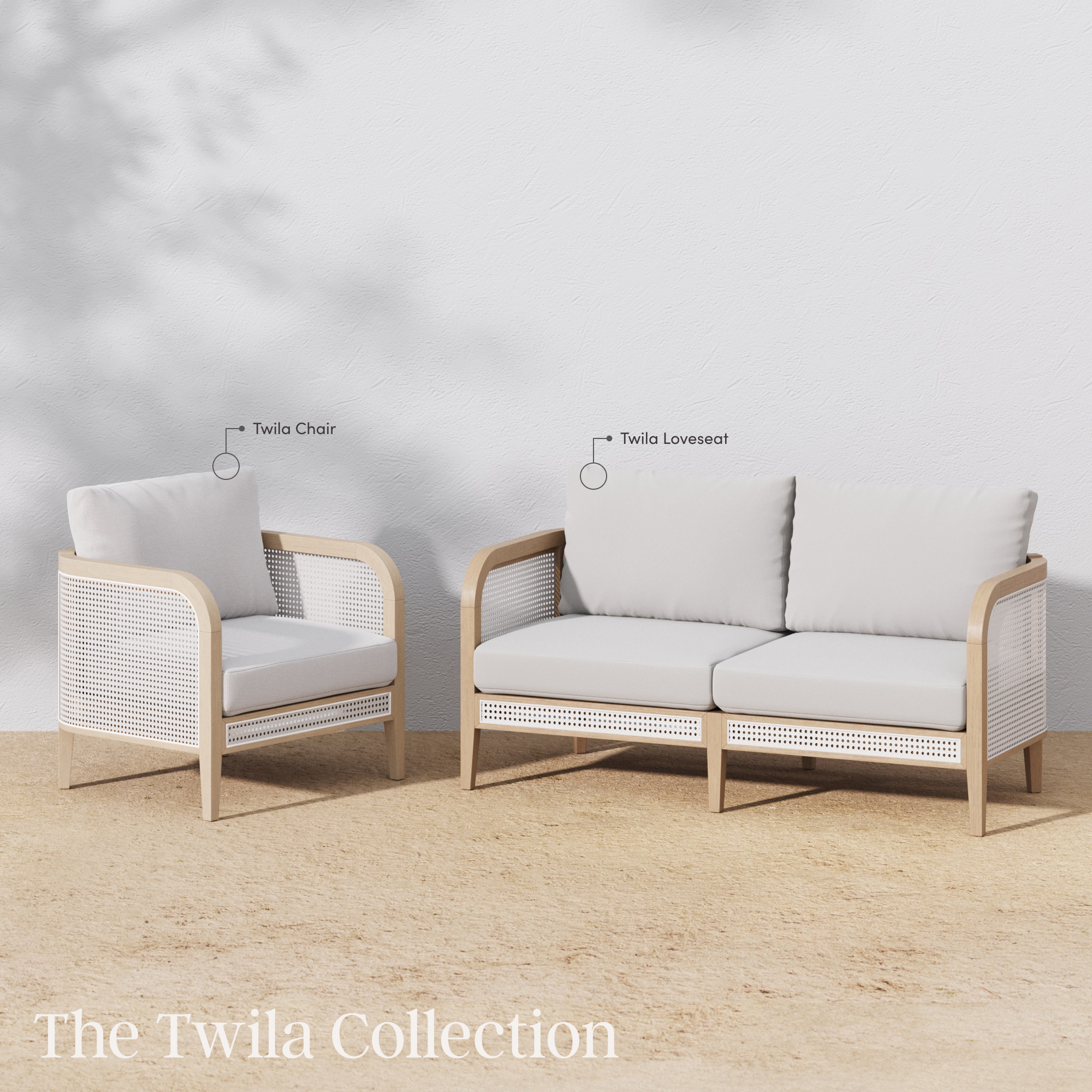 Outdoor patio set with a light wood frame and white cushions, featuring a single Twila Chair and a two-seat Twila Loveseat, on a sandy surface with text The Twila Collection at the bottom left.