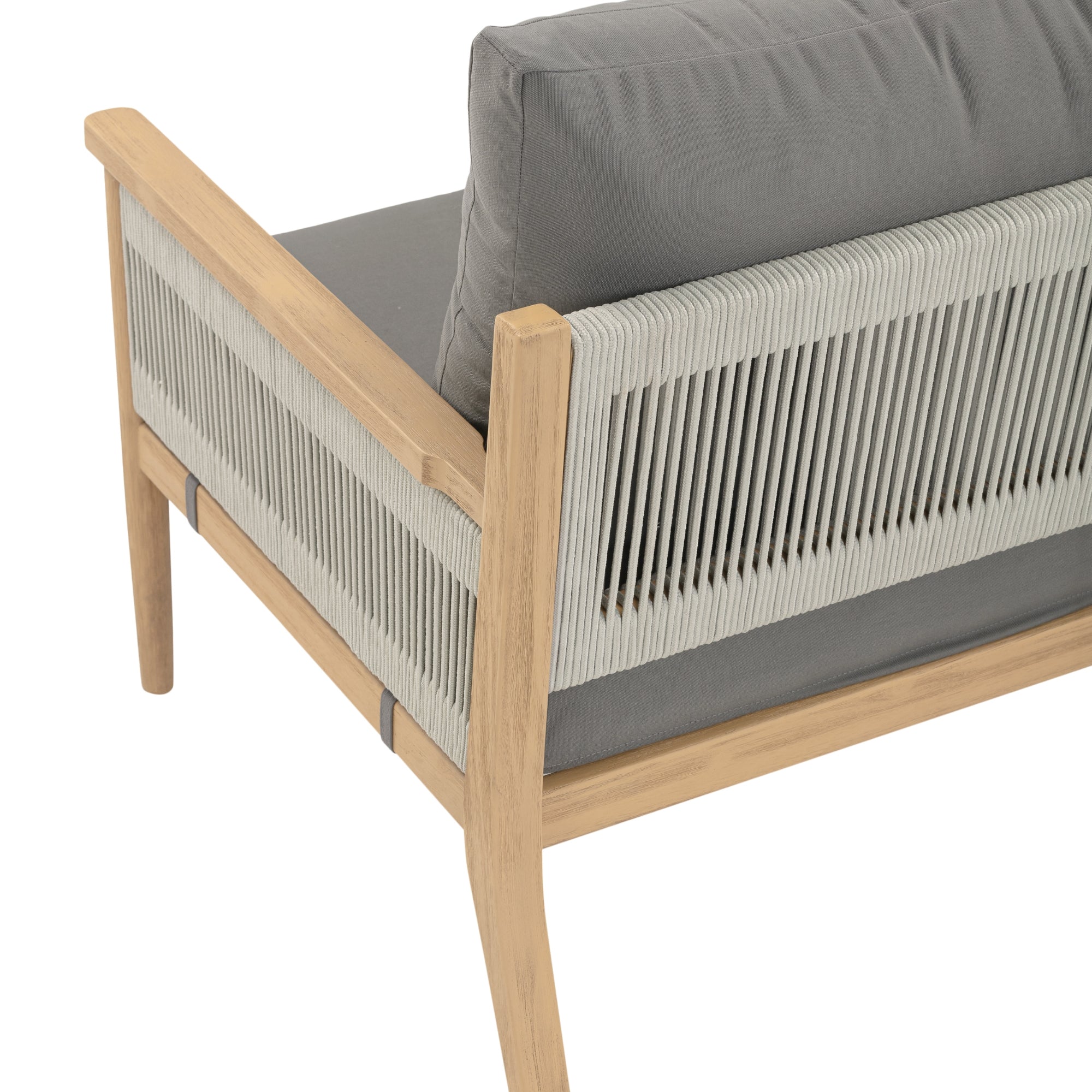 A close-up view of a modern outdoor chair with a light wood frame, gray seat and back cushions, and vertical rope detailing along the back and sides.