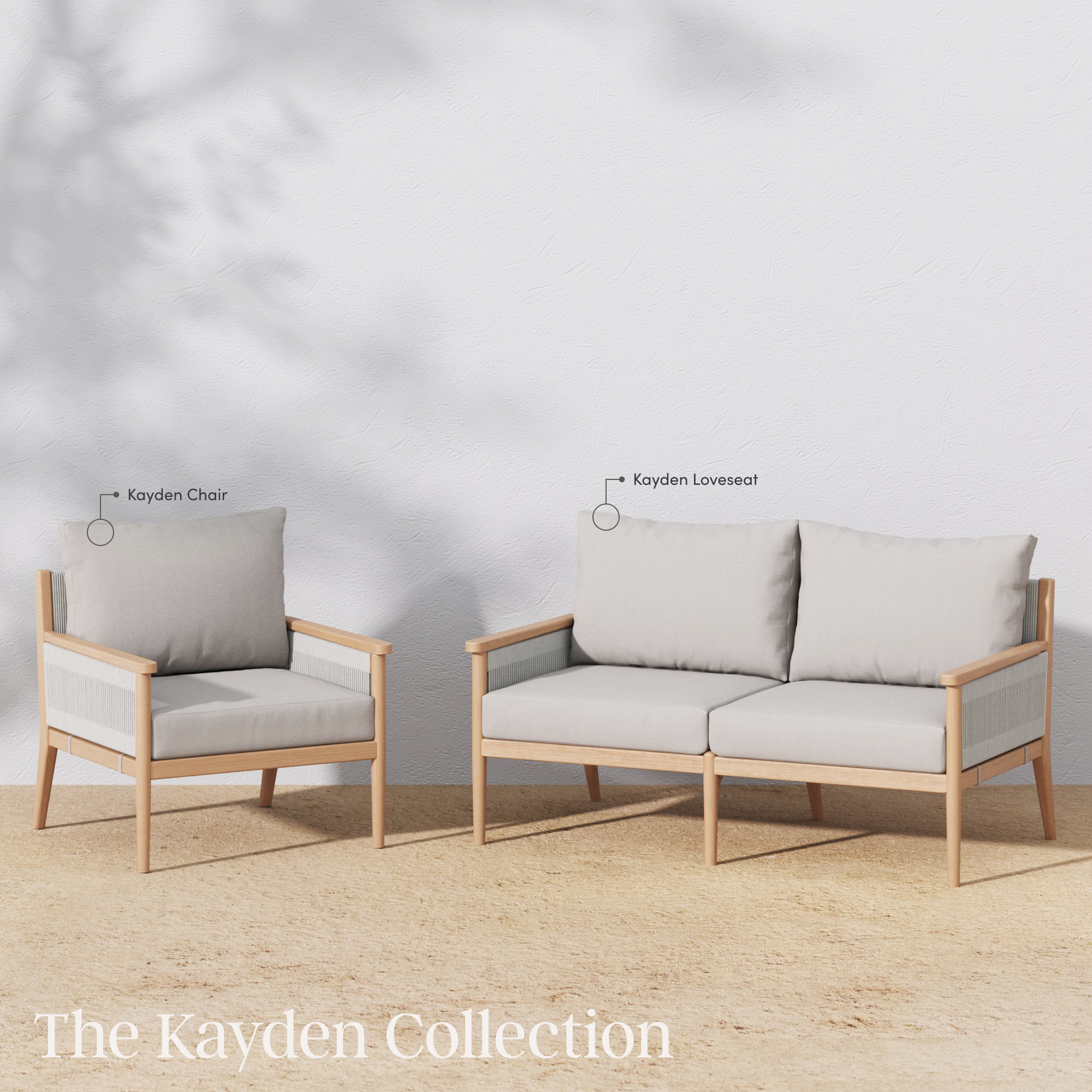 A light wood armchair and a matching two-seat loveseat with light gray cushions are displayed on a tan floor against a white wall. Labels identify them as “Kayden Chair” and “Kayden Loveseat.” Text reads: The Kayden Collection.