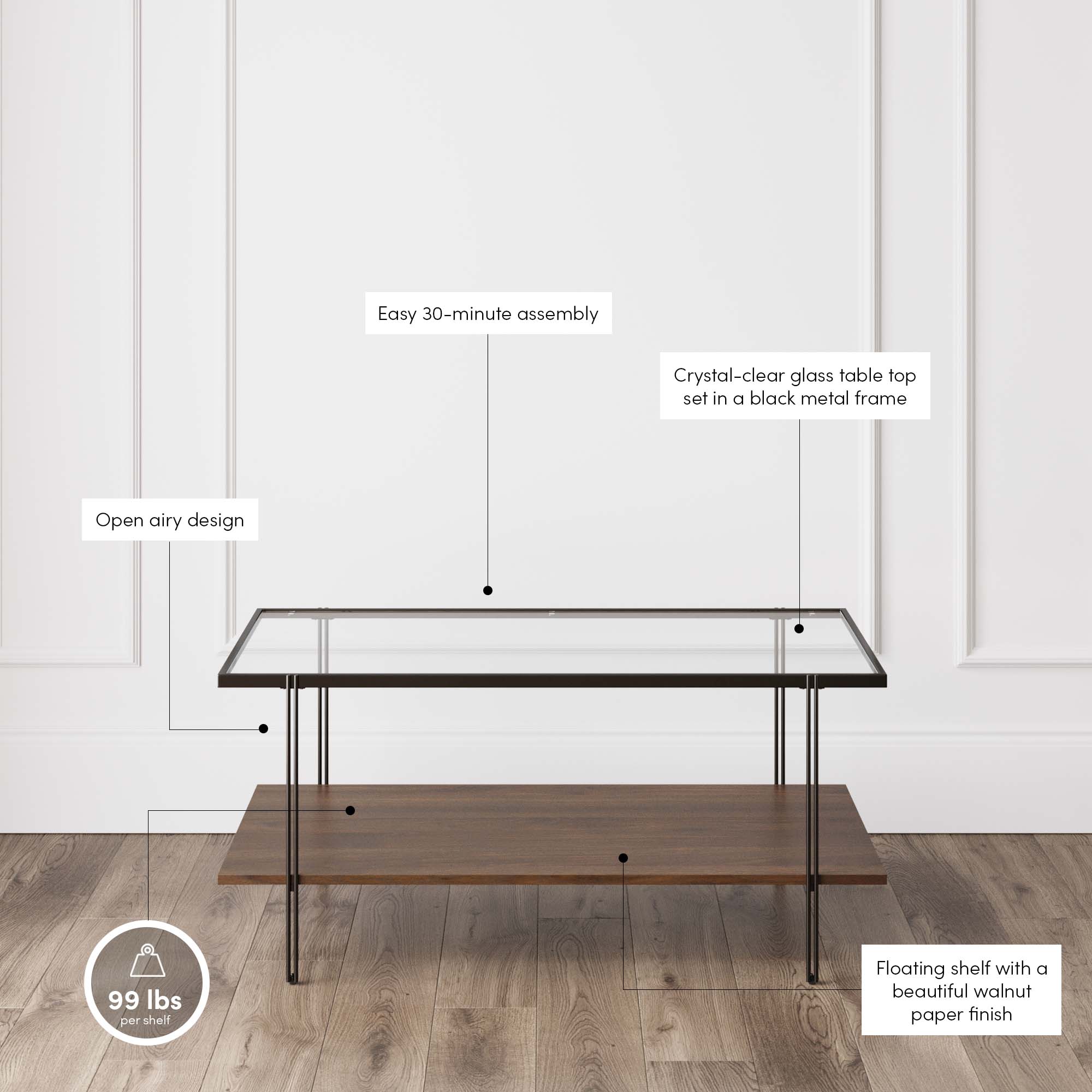 A modern coffee table with a clear glass top, black metal frame, and walnut-finish floating lower shelf is shown in a bright room with wood floors and white paneled walls. Text highlights its features and 99 lbs shelf weight limit.