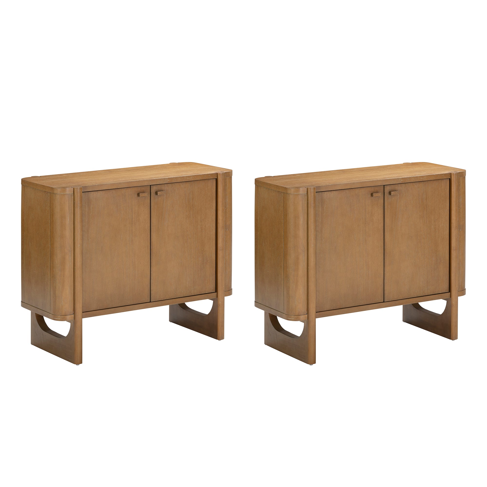 Two identical wooden cabinets with double doors, rectangular tops, and open rectangular bases. They have a warm, medium-brown finish and a minimalist, modern design. The cabinets are positioned side by side against a white background.
