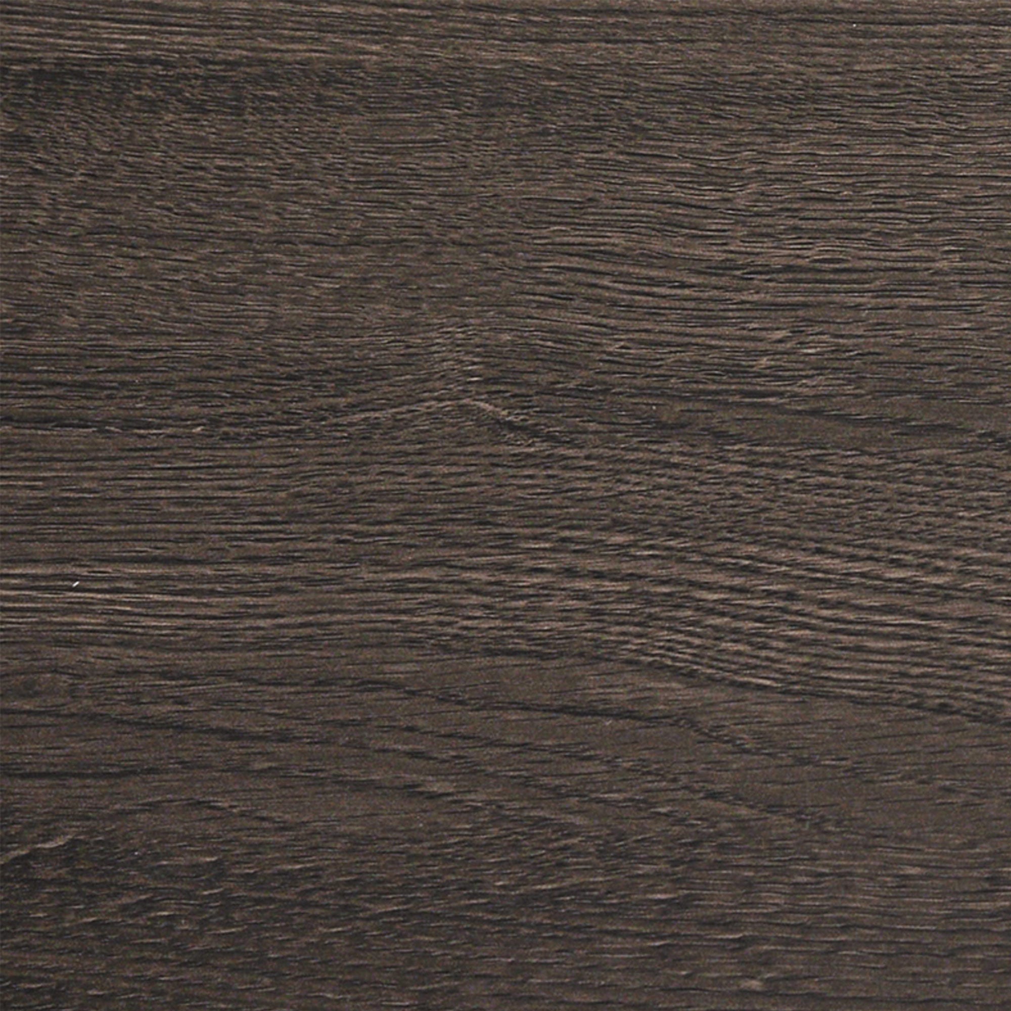Dark brown wooden surface with visible natural grain patterns and subtle texture running horizontally across the image.