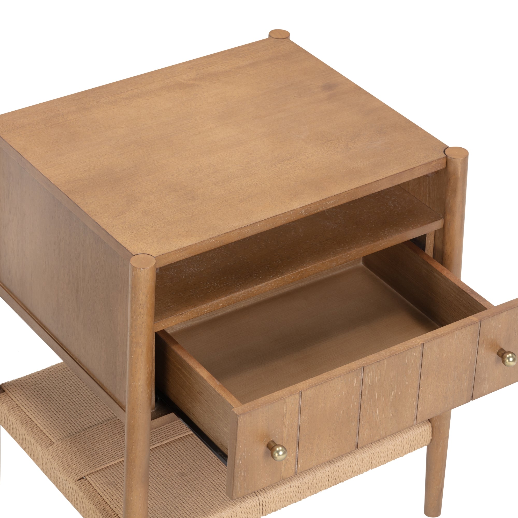 A wooden nightstand with a single open drawer, an open shelf above the drawer, round metal knobs, and woven shelf at the bottom. The wood has a light, natural finish.