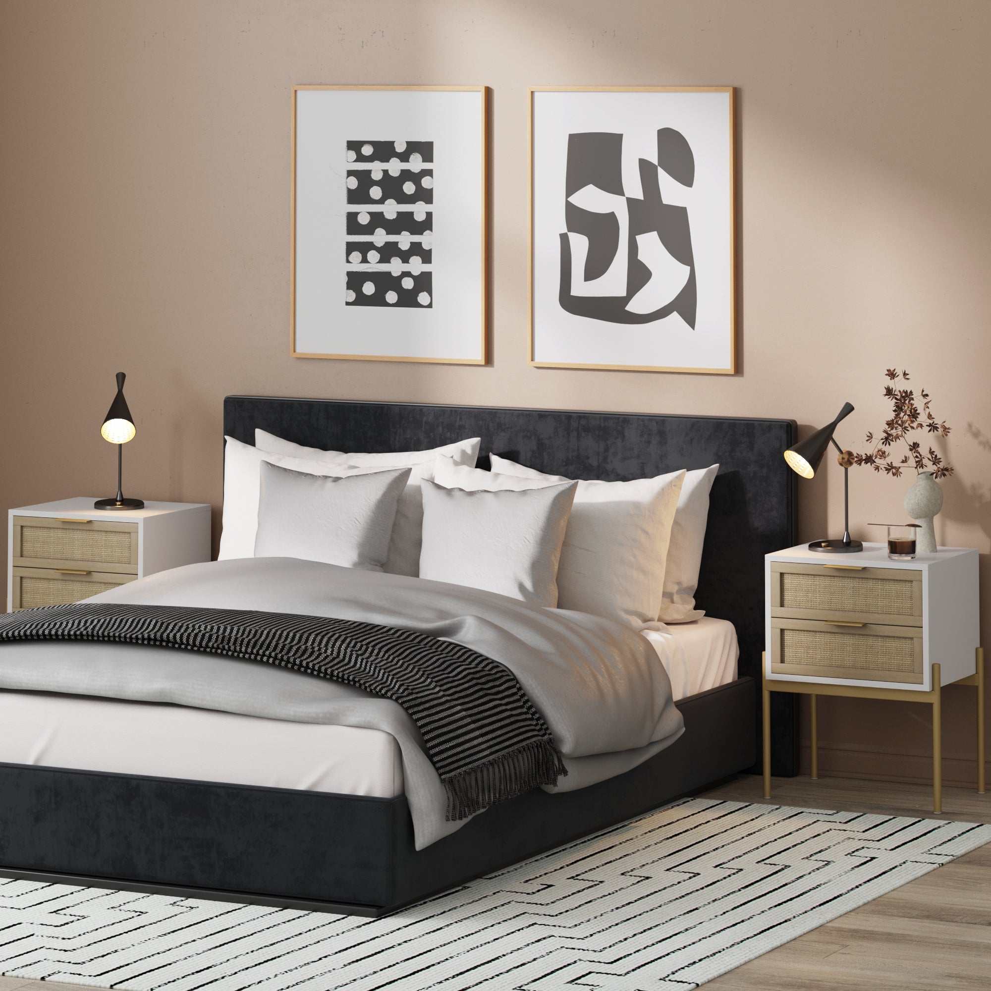 Modern bedroom featuring a black upholstered bed, white and gray bedding, Nathan James Wood & Rattan Nightstands White (Set of 2) with lamps, minimalist wall art, and a patterned rug on a wooden floor.
