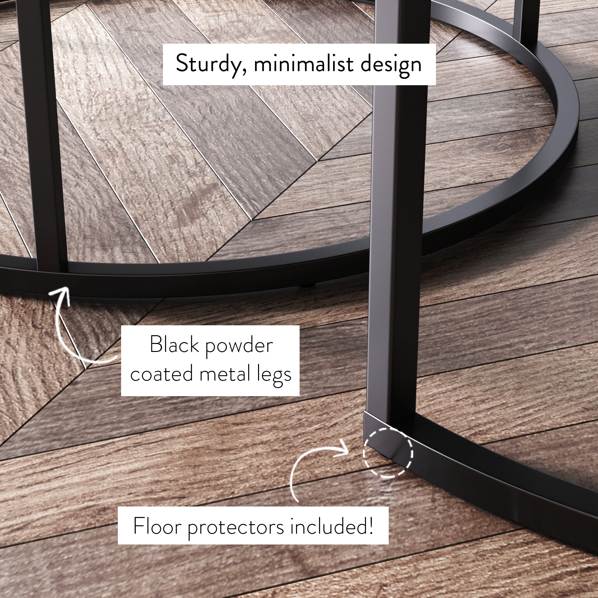 A close-up of a round tables black metal legs on a wood-patterned floor, highlighting sturdy minimalist design, black powder-coated metal legs, and included floor protectors with labeled text.