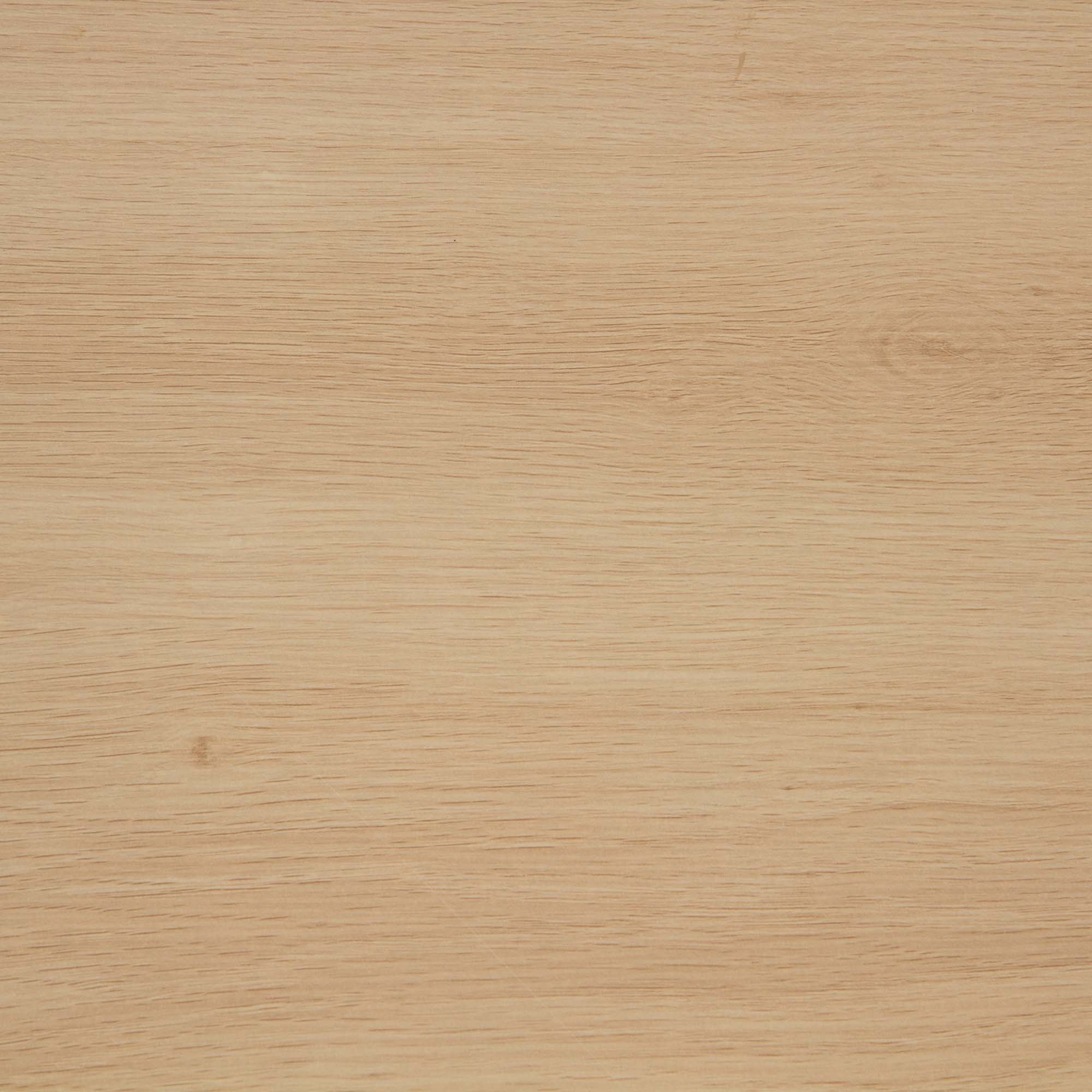 A close-up view of a light brown wooden surface with a smooth texture and visible grain patterns running horizontally across the image.