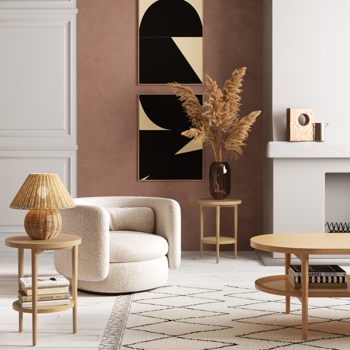 Modern living room with a beige swivel chair, round wooden tables, a lamp with a woven shade, a vase with pampas grass, geometric wall art, and a light patterned rug on a wooden floor.