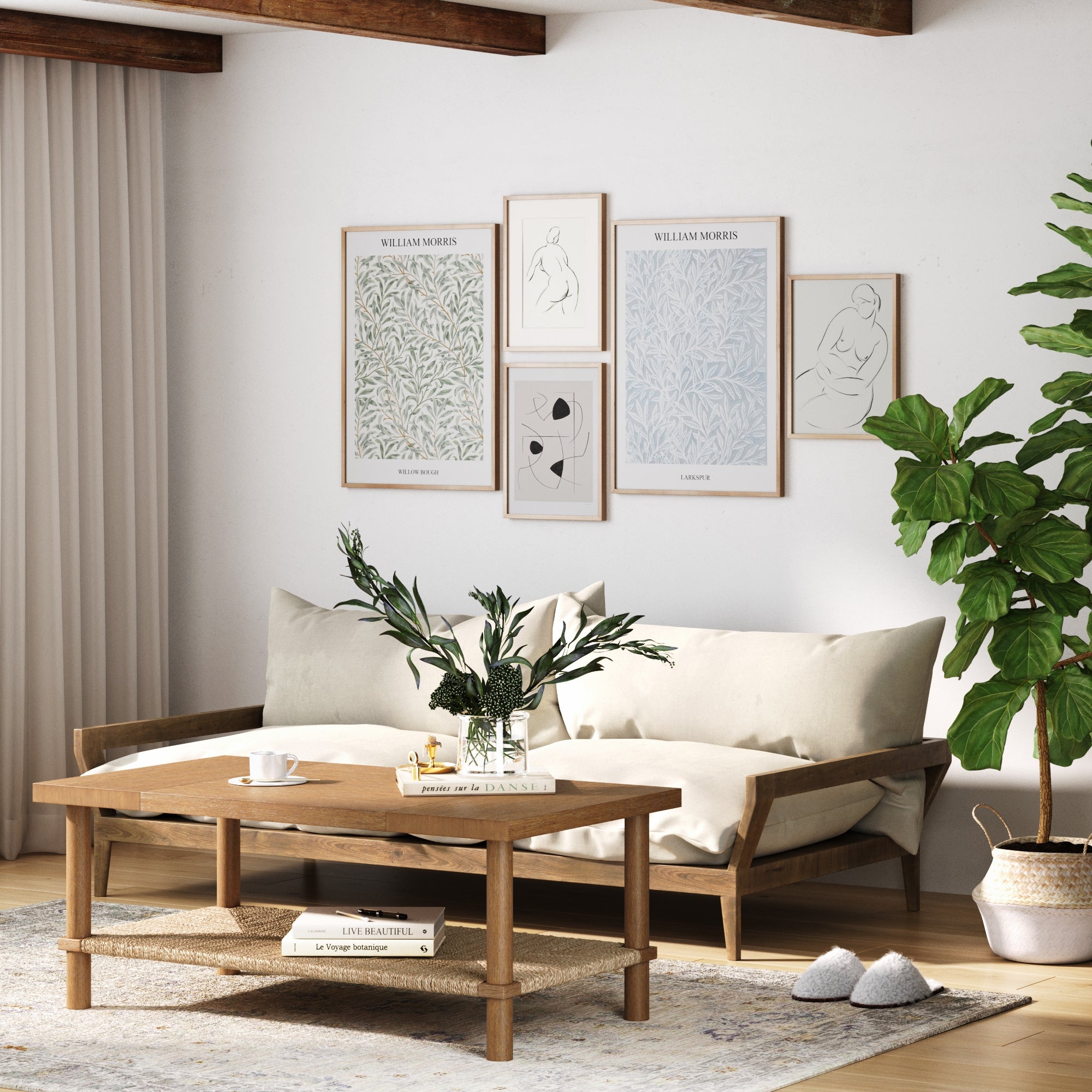 A cozy living room with a wooden sofa and cream cushions, the Nathan James Boho Seagrass & Wood Coffee Table topped with a vase of greenery, framed art on the wall, woven seagrass shelf, potted plant, light rug, and sheer-curtained windows.