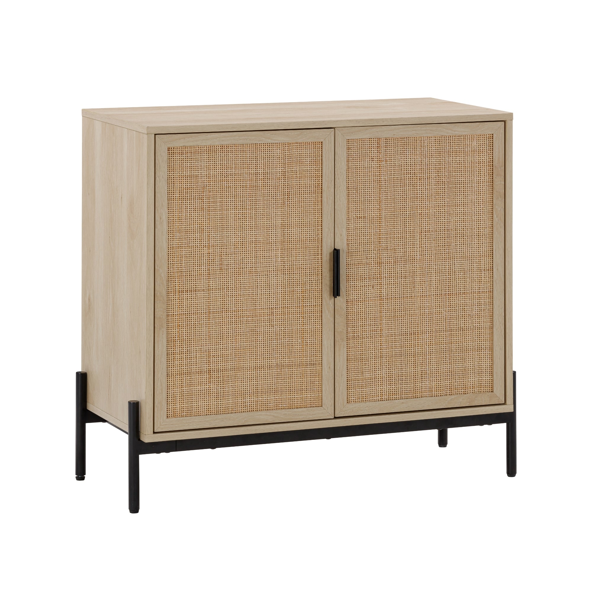 A light wood storage cabinet with two woven rattan doors, black metal handles, and black metal legs. The design is modern and minimalist.