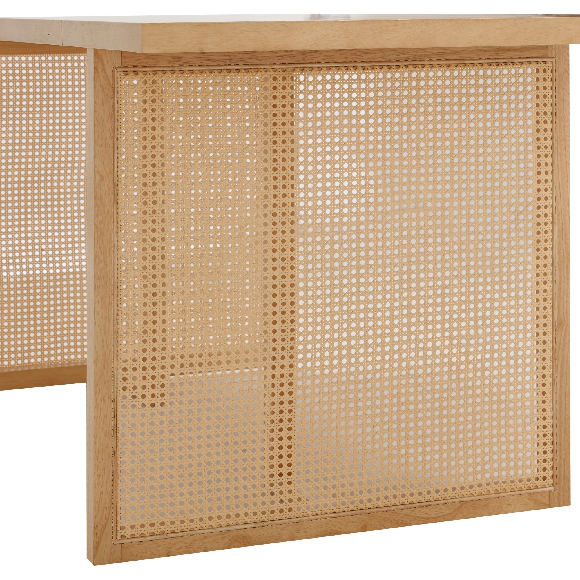 A close-up of a table base made from light wood with a woven cane panel, showcasing the texture and pattern of the cane material. The tabletop appears to be a solid, lighter-colored surface.