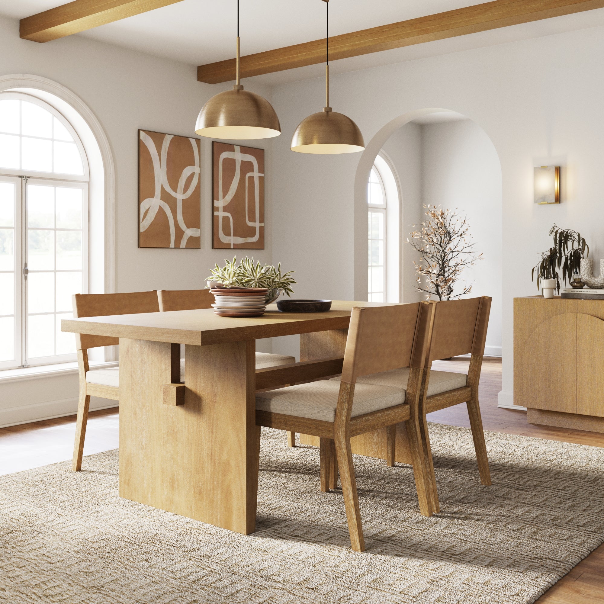 A modern dining room with a wooden table, matching chairs, a bench, two pendant lights, abstract wall art, large windows, and neutral decor in warm tones. Plants and soft natural light complete the cozy atmosphere.
