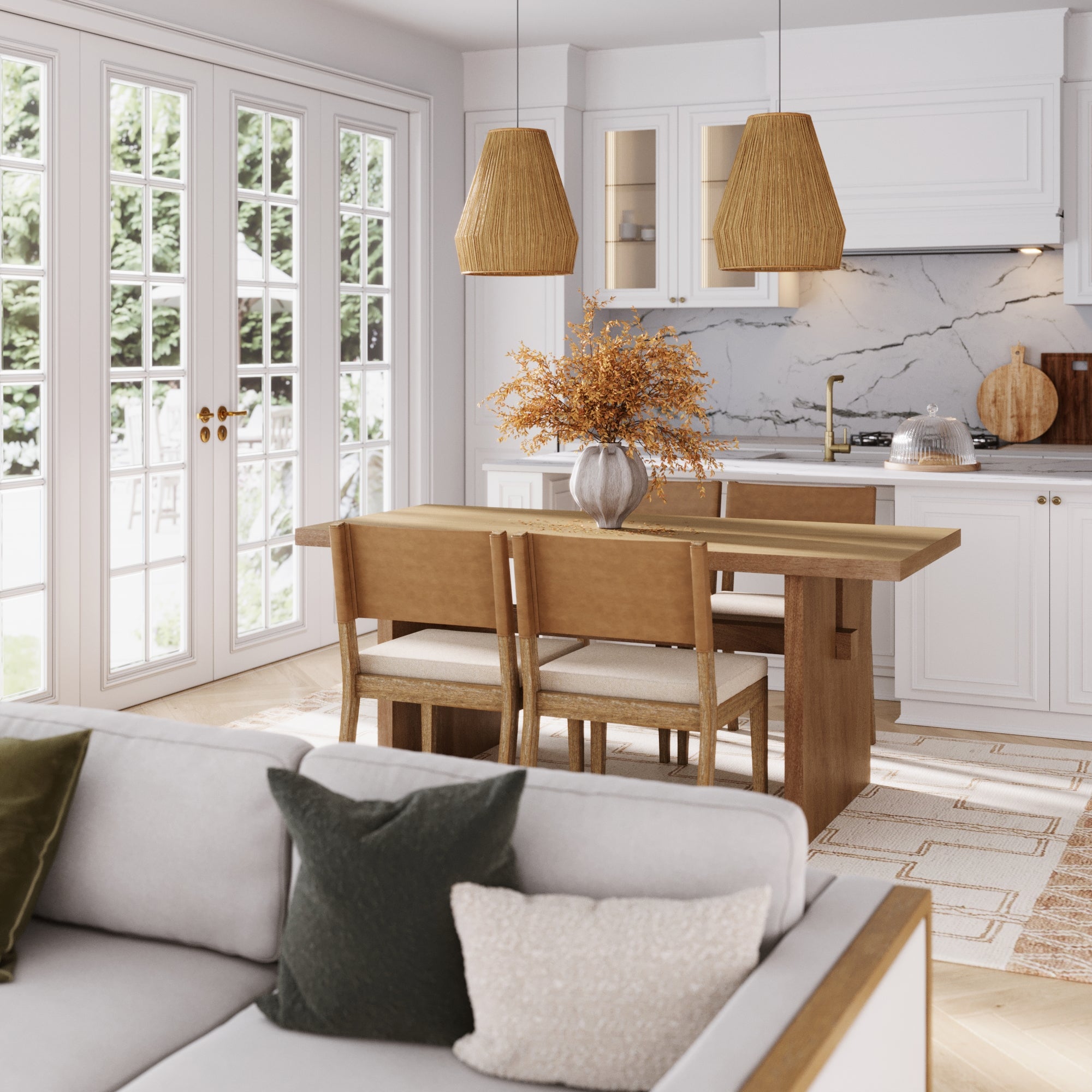 A modern kitchen and dining area features the Nathan James Farmhouse Dining Set with 4 matching chairs, pendant lights, a vase with dried flowers on the table, and large windows for natural light. A sofa with cushions sits in the foreground.