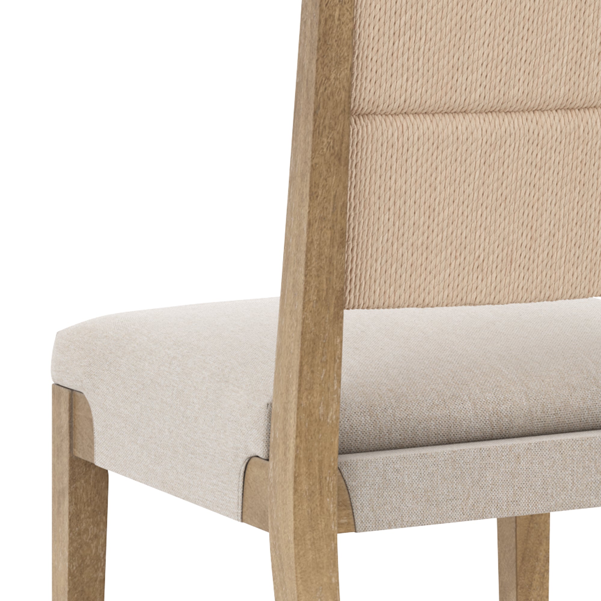 A close-up of a wooden chair with light beige upholstered seat and backrest, featuring textured fabric on the back and smooth fabric on the seat.