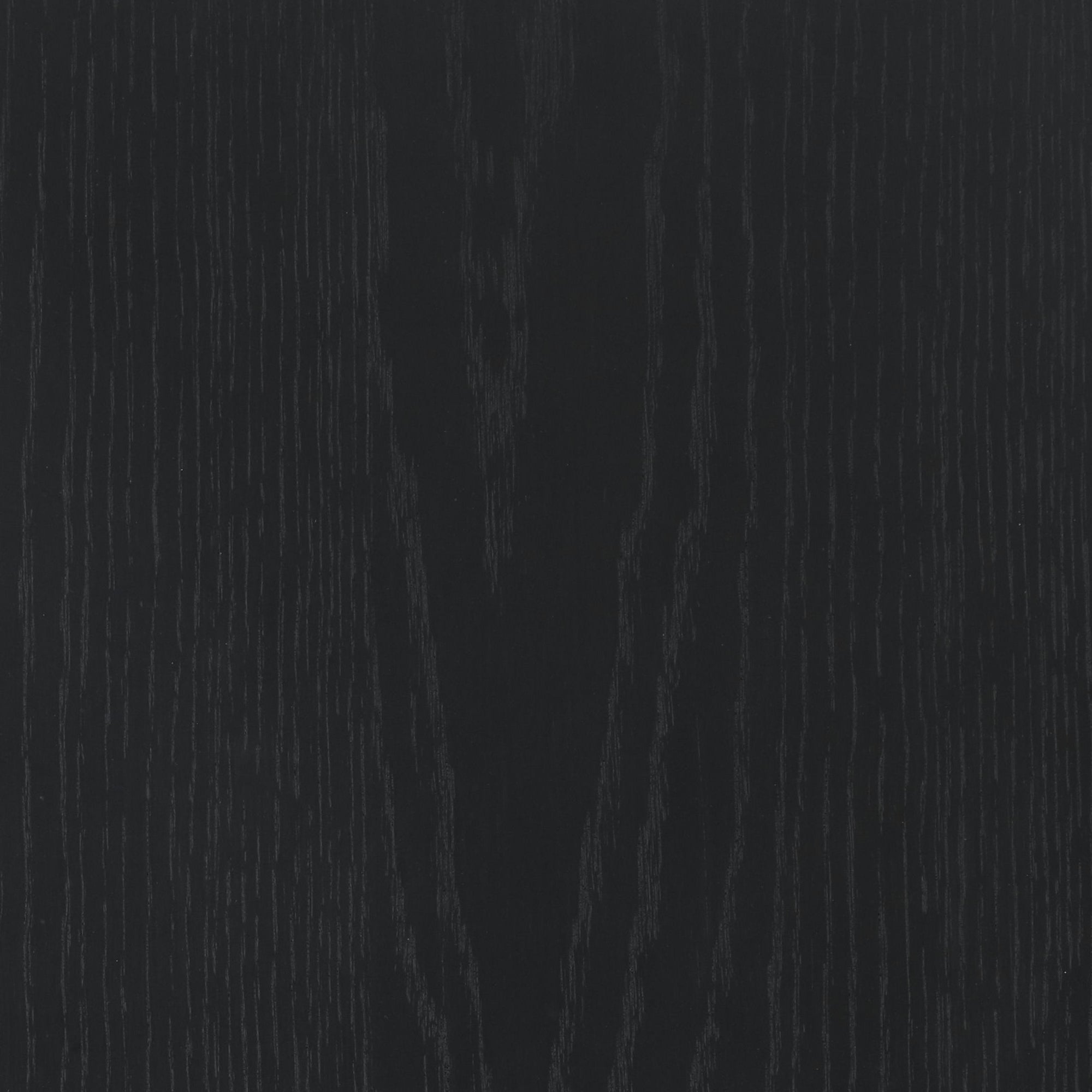 Dark wood texture with visible grain patterns running vertically. The surface appears smooth with subtle variations in the shade of black, giving it a natural and elegant look.