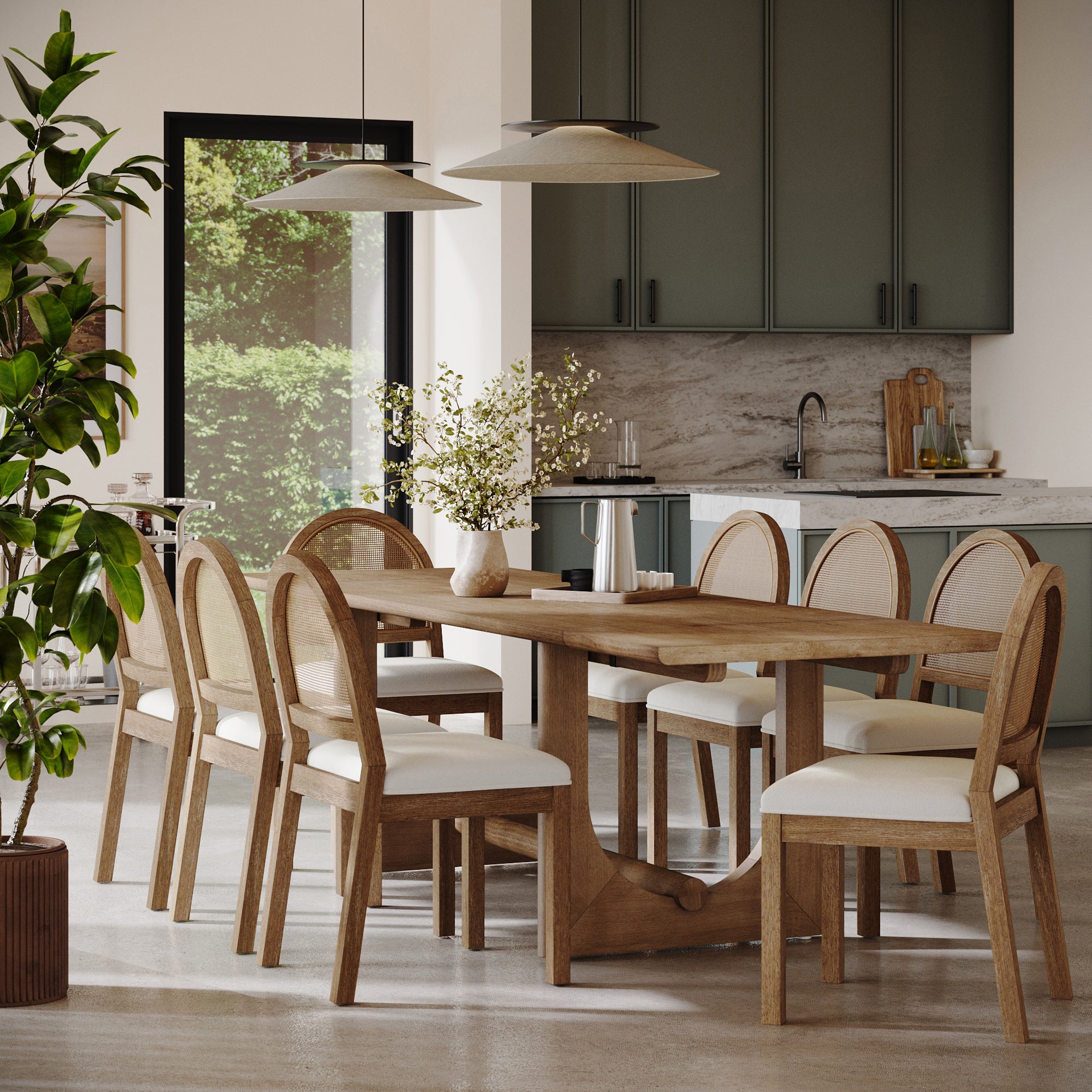 A modern dining room showcases the Nathan James Wood Dining Room Table with Leaf Extension for 8, eight cushioned chairs, a vase with branches, pendant lights, green cabinets, a marble backsplash, large window views, and a potted plant in front.