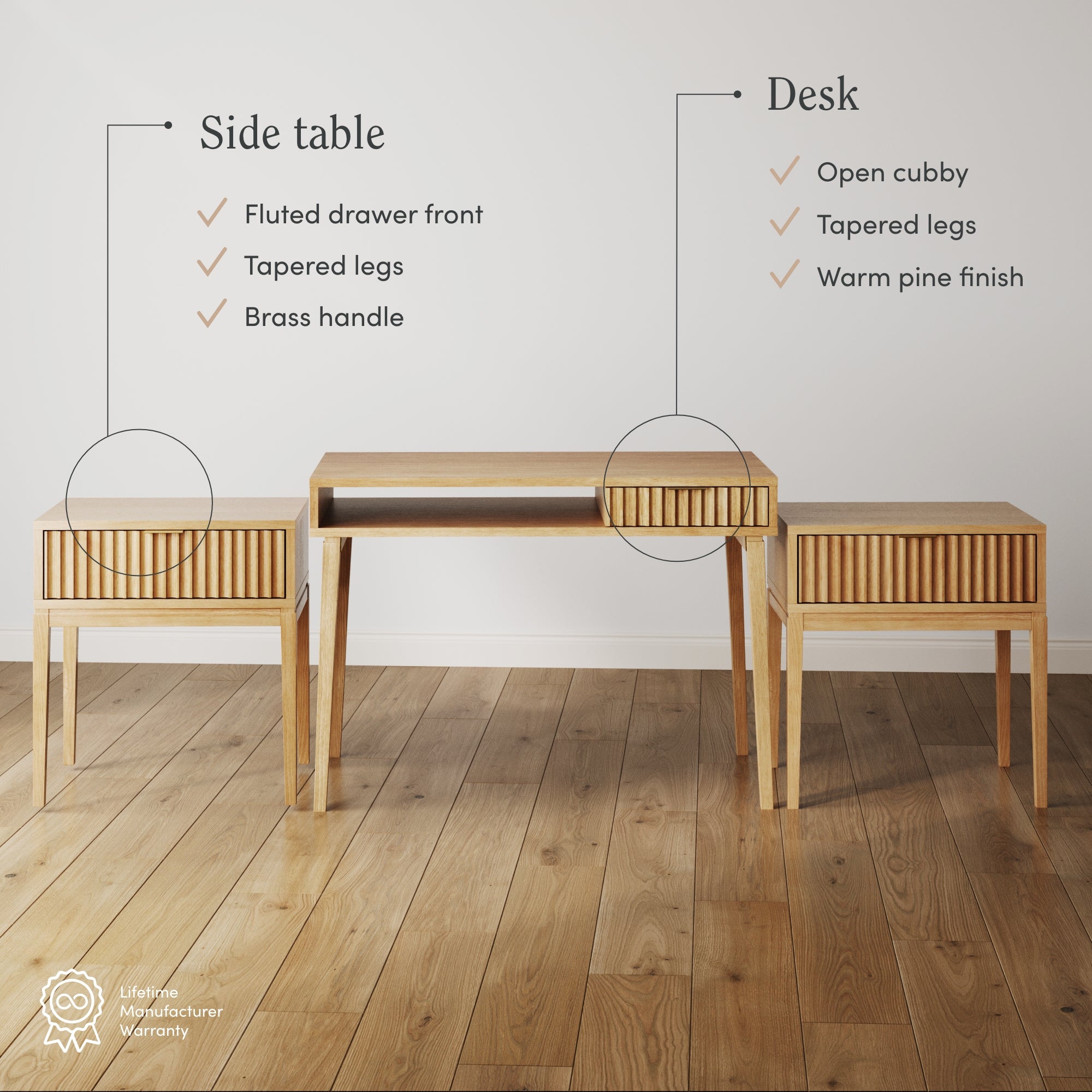 A wooden desk with an open cubby and two matching side tables featuring fluted drawer fronts, tapered legs, and brass handles, all with a warm pine finish, arranged on a hardwood floor.
