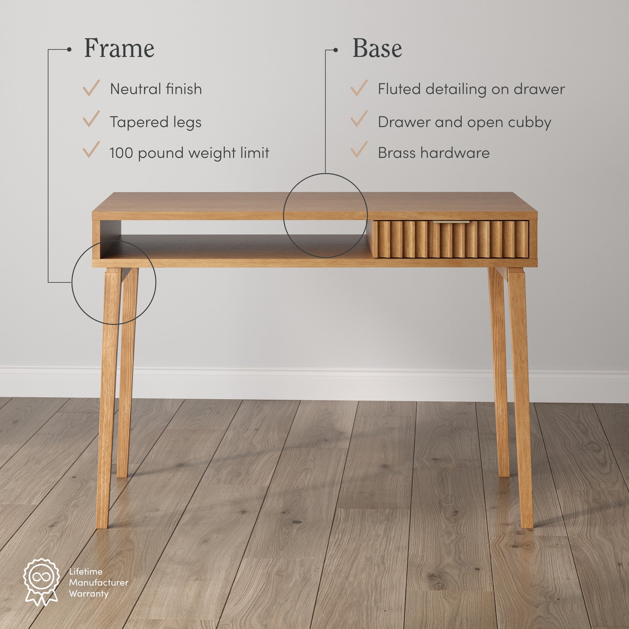 A modern wooden desk with tapered legs, a neutral finish, an open cubby, and a fluted drawer with brass hardware. Text highlights its features and a 100-pound weight limit. The desk stands on wood flooring.