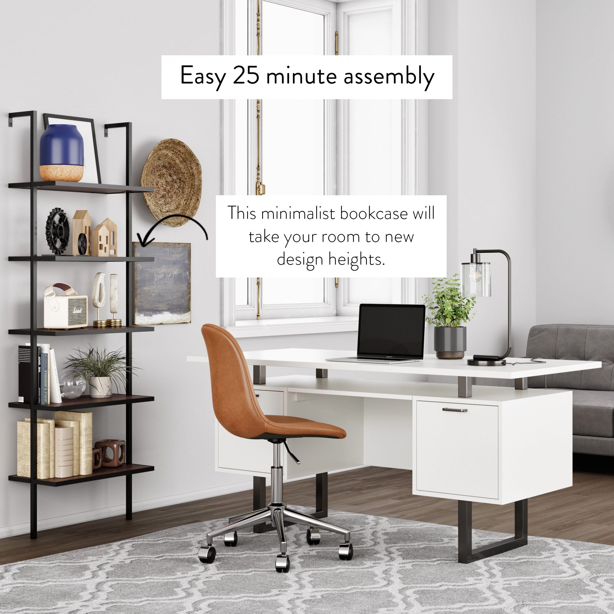 A modern home office with a minimalist black metal and wood bookcase, white desk, brown office chair, lamp, laptop, and decorative items. Text reads: Easy 25 minute assembly. This minimalist bookcase will take your room to new design heights.