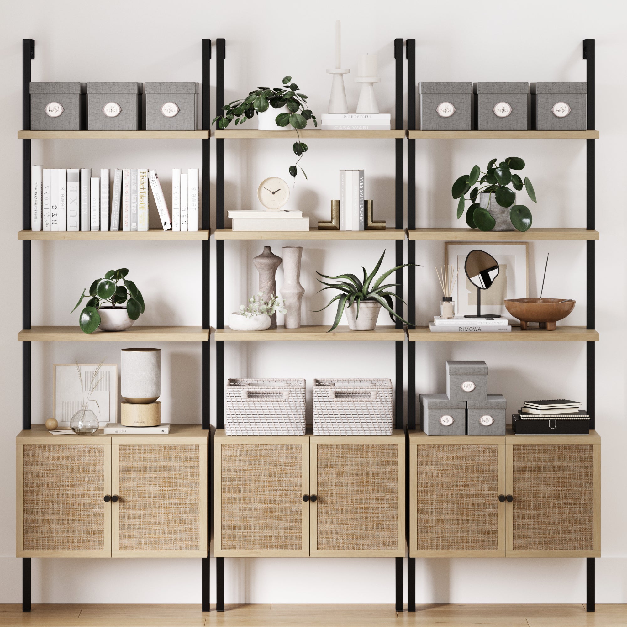 The Nathan James Rattan Ladder Wall Bookshelves with Doors in Light Oak (Set of 3) offers stylish, space-saving storage with drawers, blending seamlessly against a white wall for modern decor and organization.