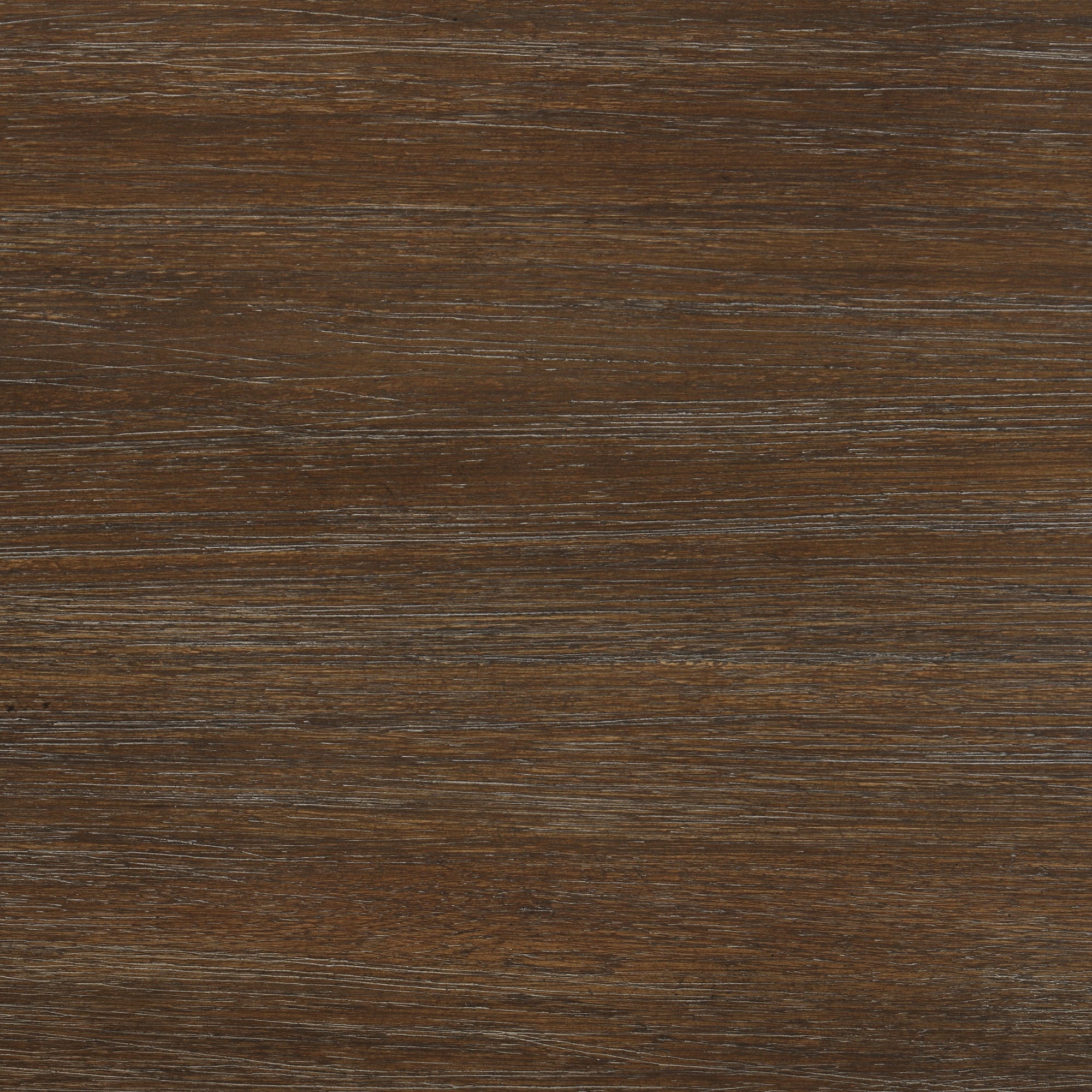 Dark brown wooden surface with visible horizontal grain patterns and natural texture. The wood has a slightly weathered appearance, showing lighter and darker streaks throughout.