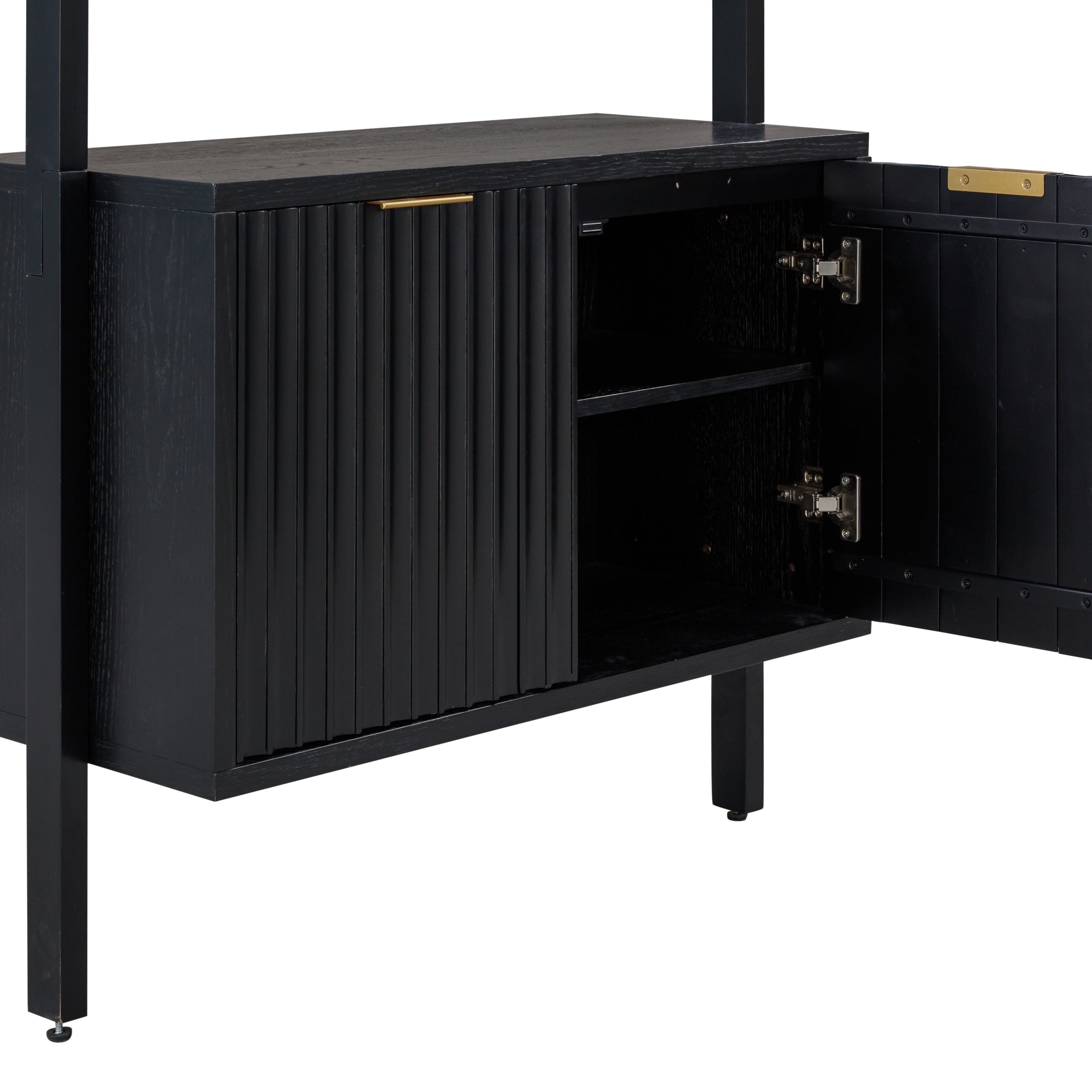 A modern black cabinet with vertical grooves on one door, brass handle, and an open door showing two interior shelves. The cabinet stands on four slim legs.